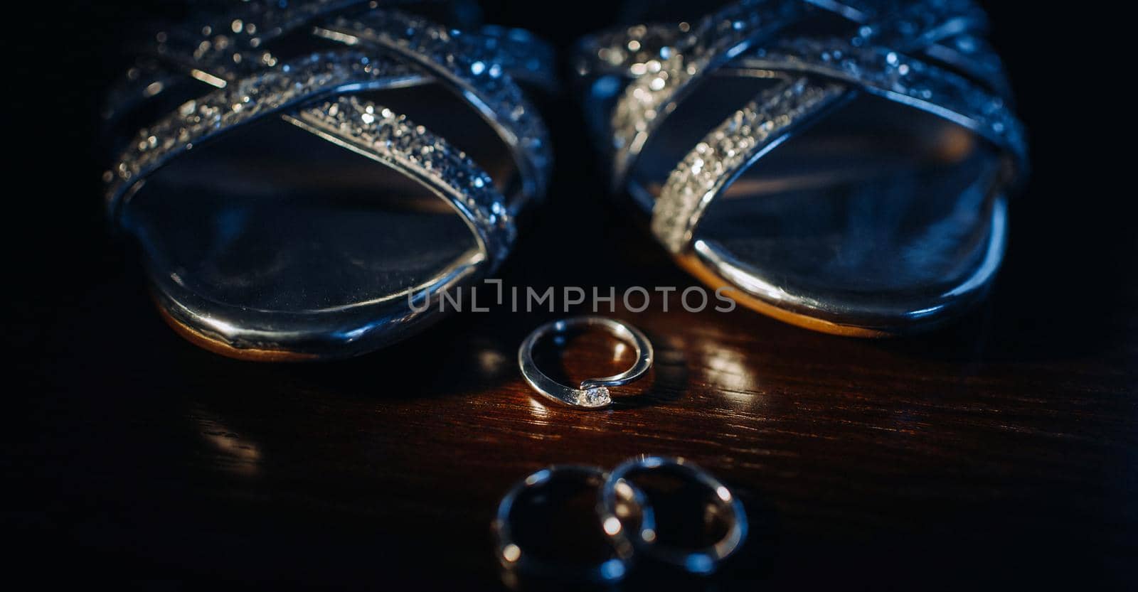 Close-up of two gold wedding rings in a black background.Wedding ring.Wedding rings.