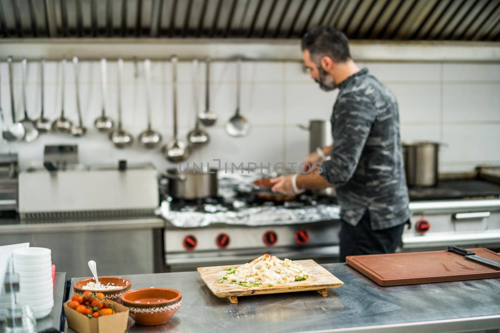 Chef in kitchen by djoronimo