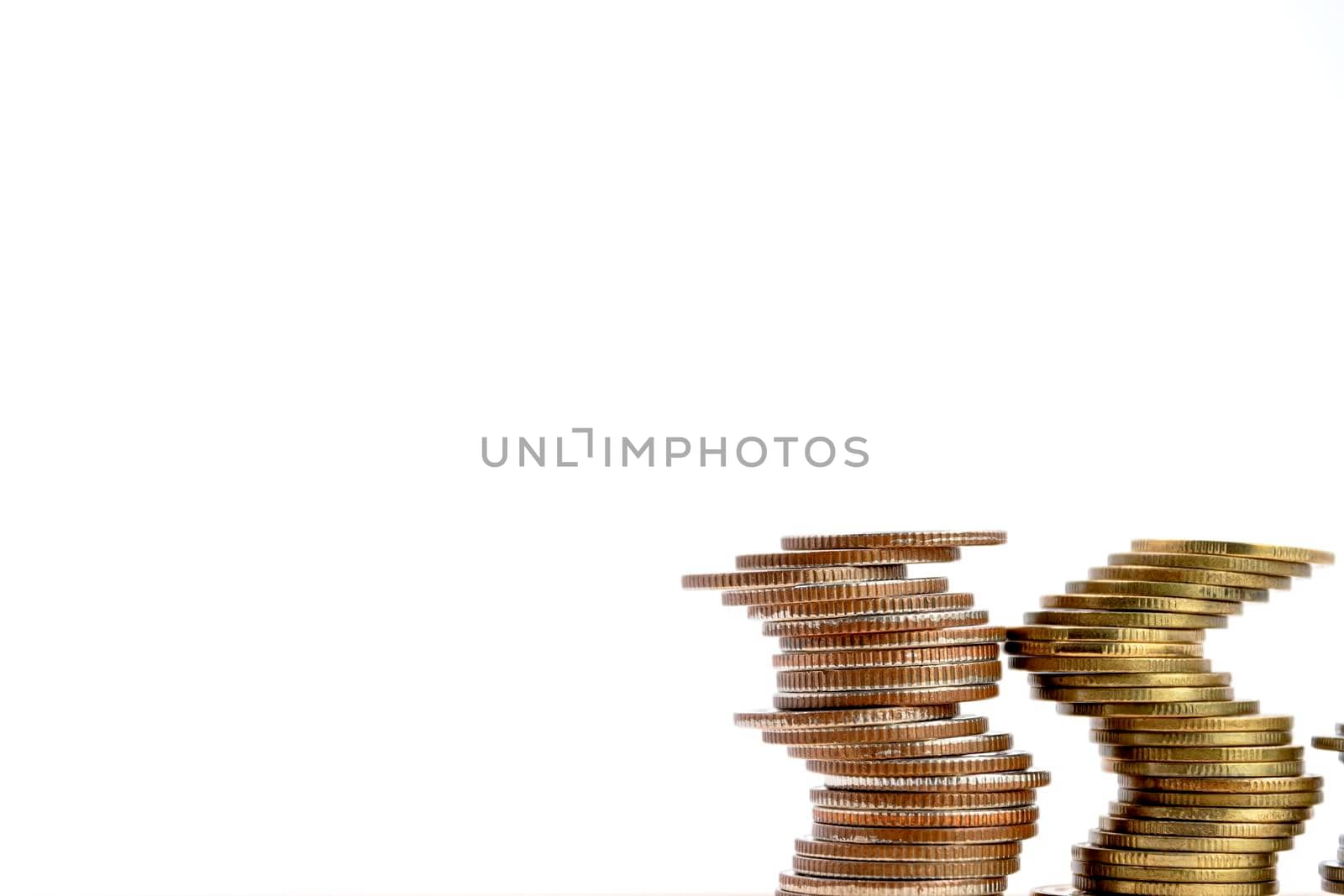 Stack of coins isolated on white background, with copy space, use for business and finance concepts.