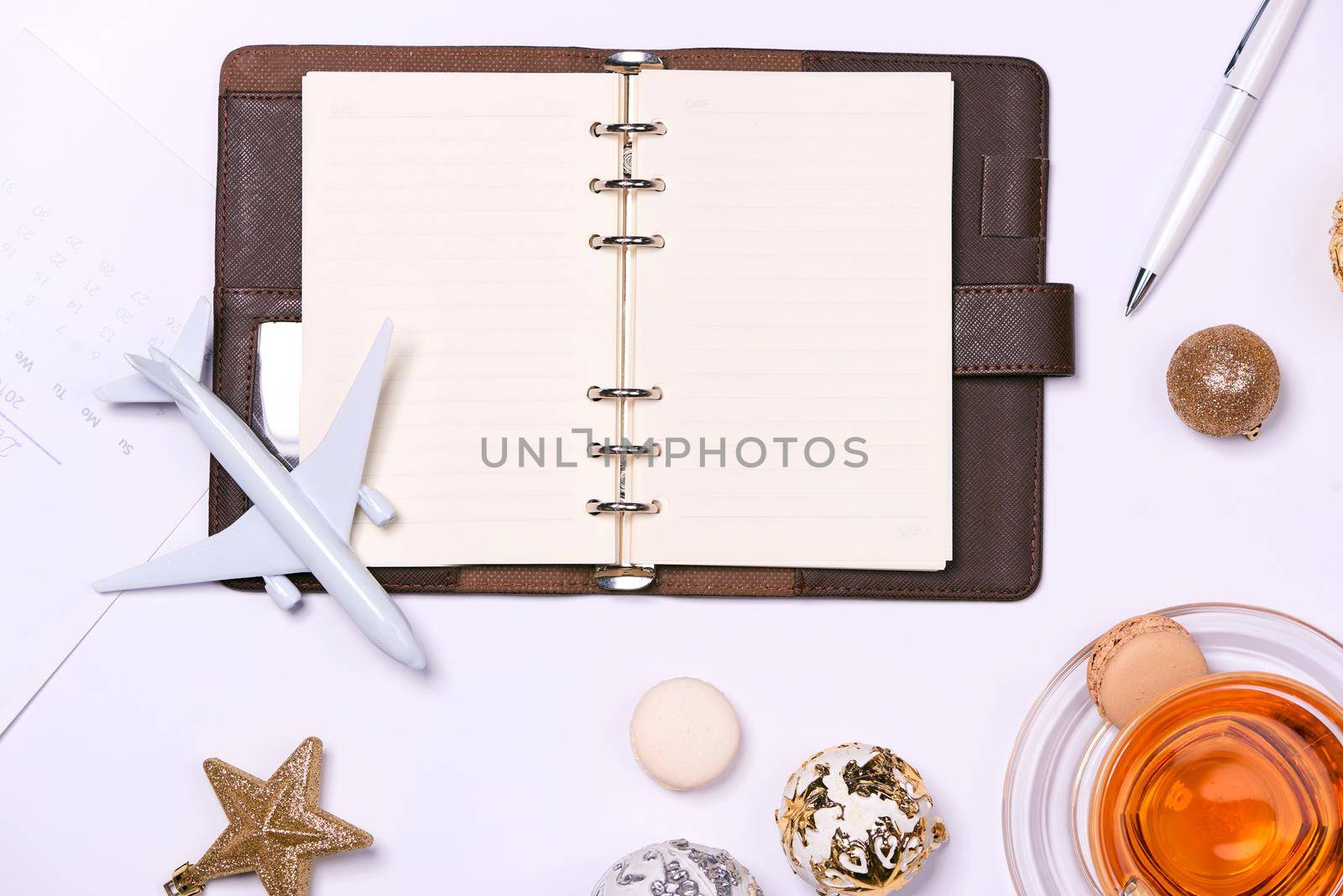 Travel background concept. Composition with empty book and travel accessories on white background.