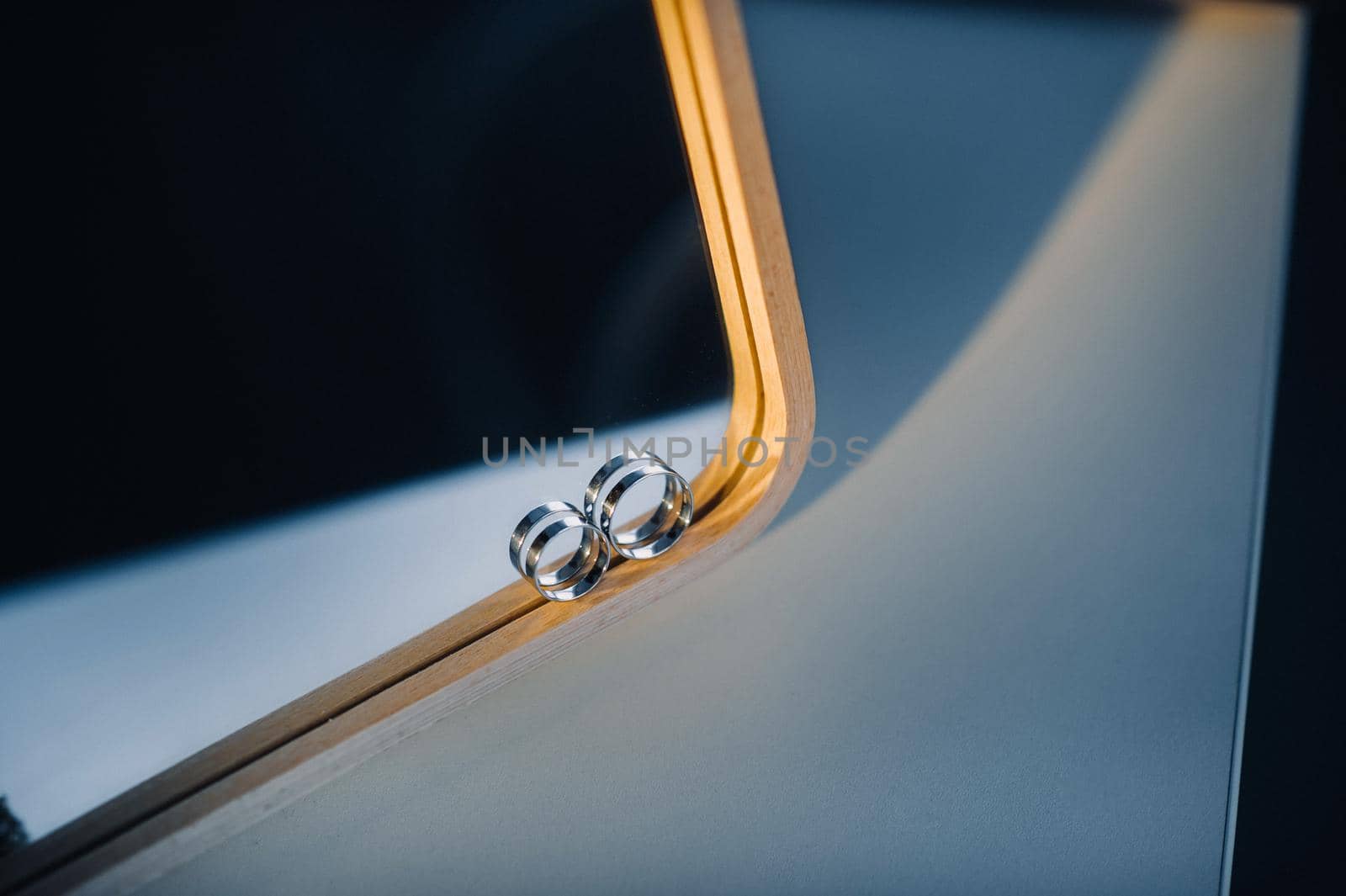 Close-up of two gold wedding rings for a wedding.