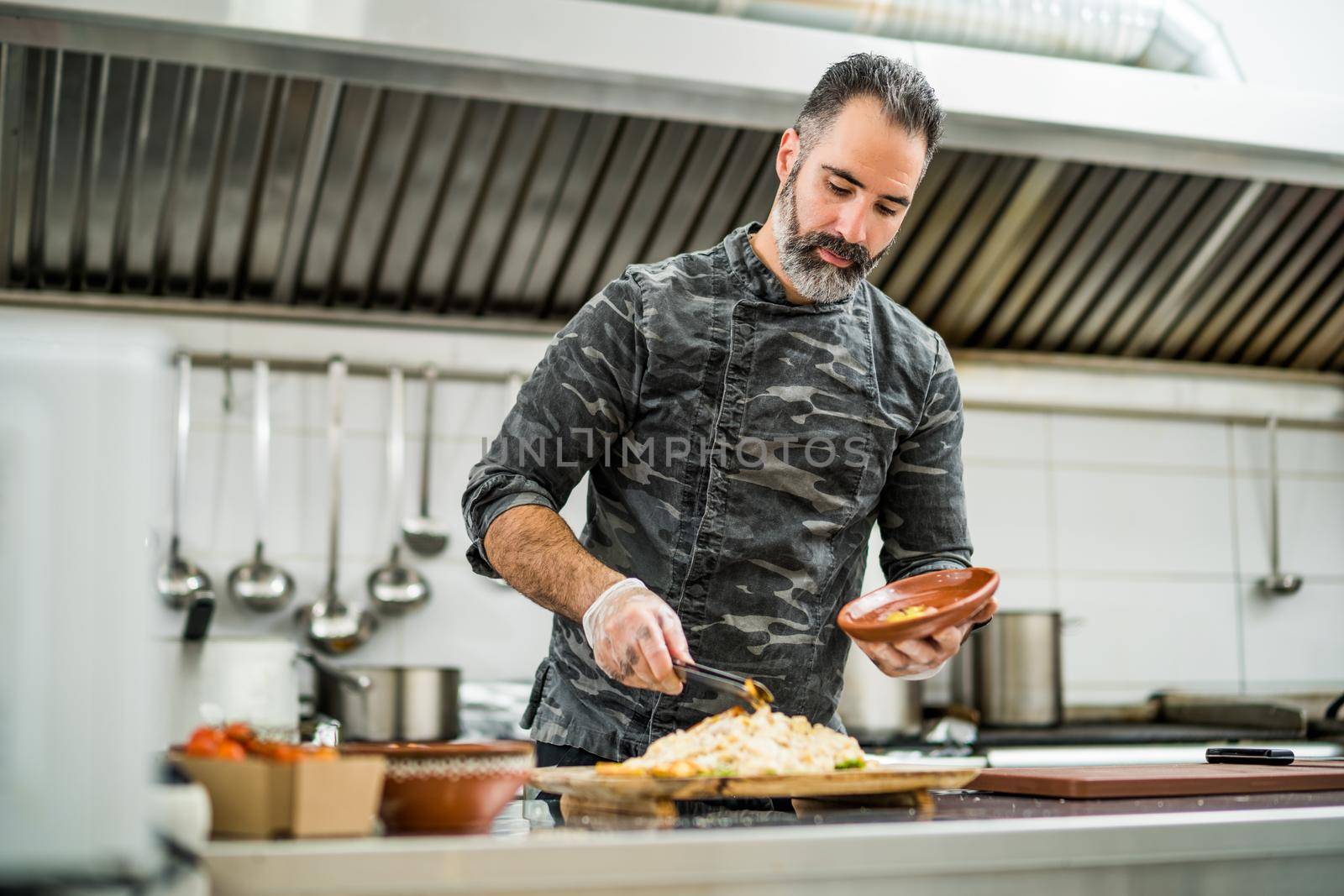 Chef in kitchen by djoronimo