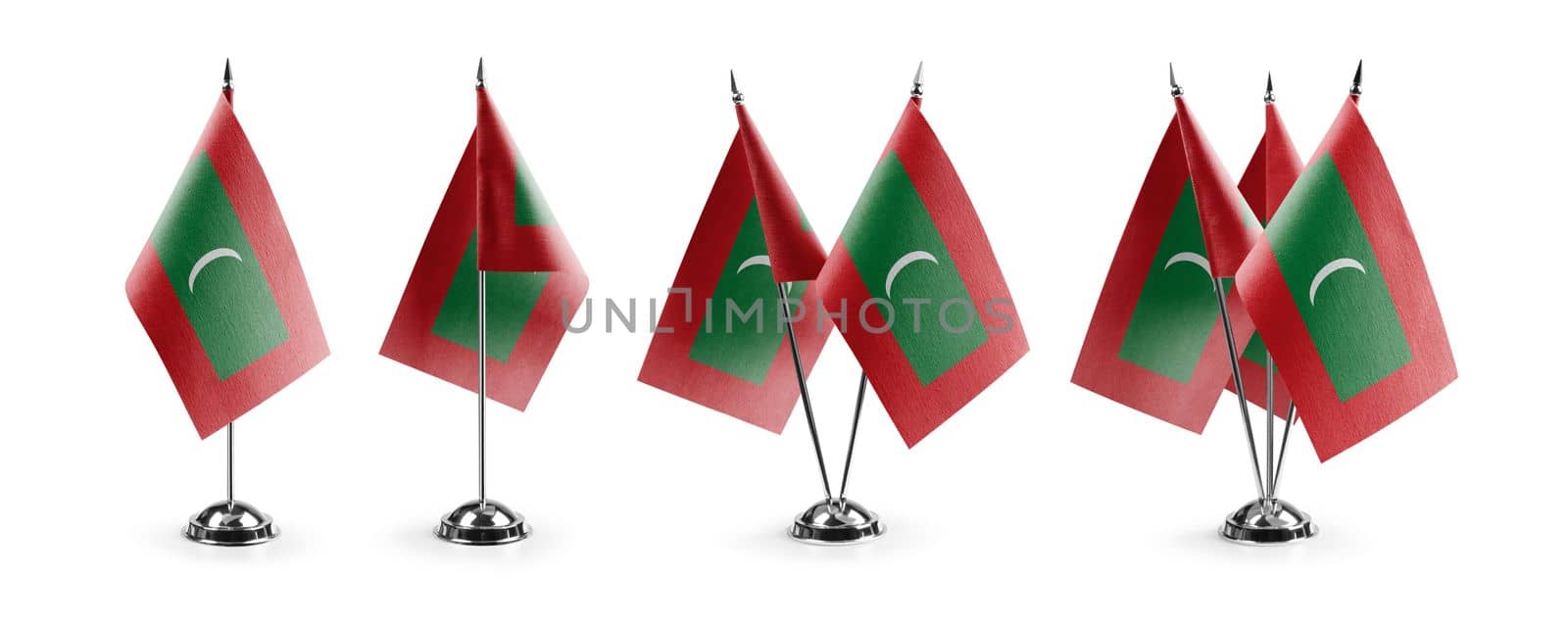 Small national flags of the Maldives on a white background by butenkow