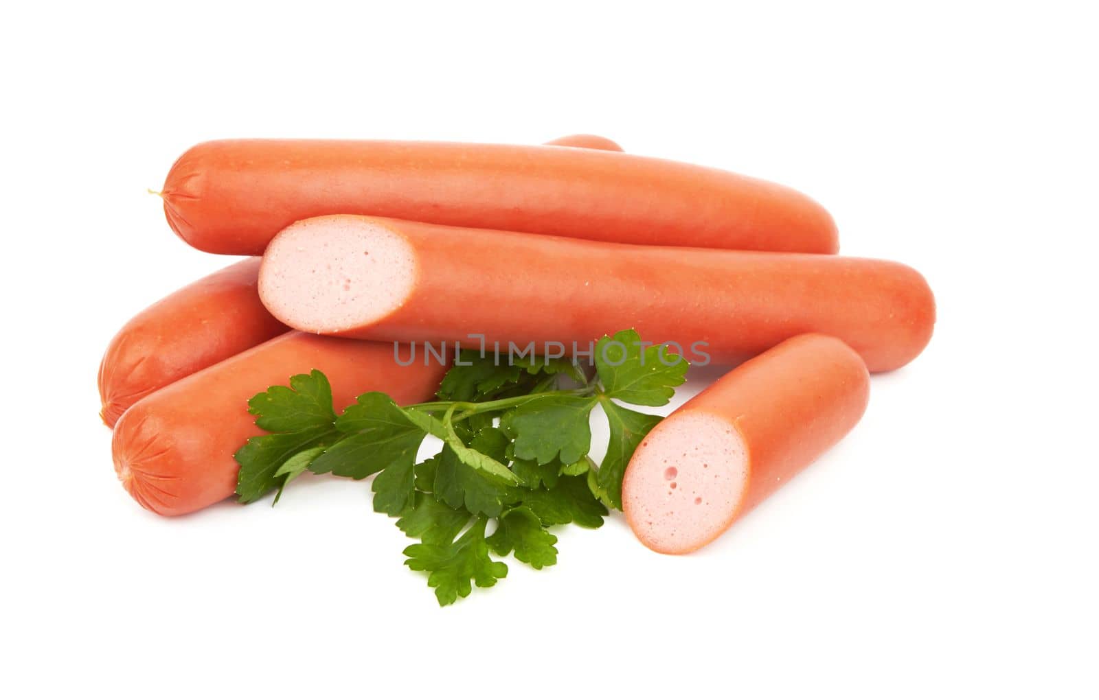 Fresh sausages with parsley leaves isolated on white background