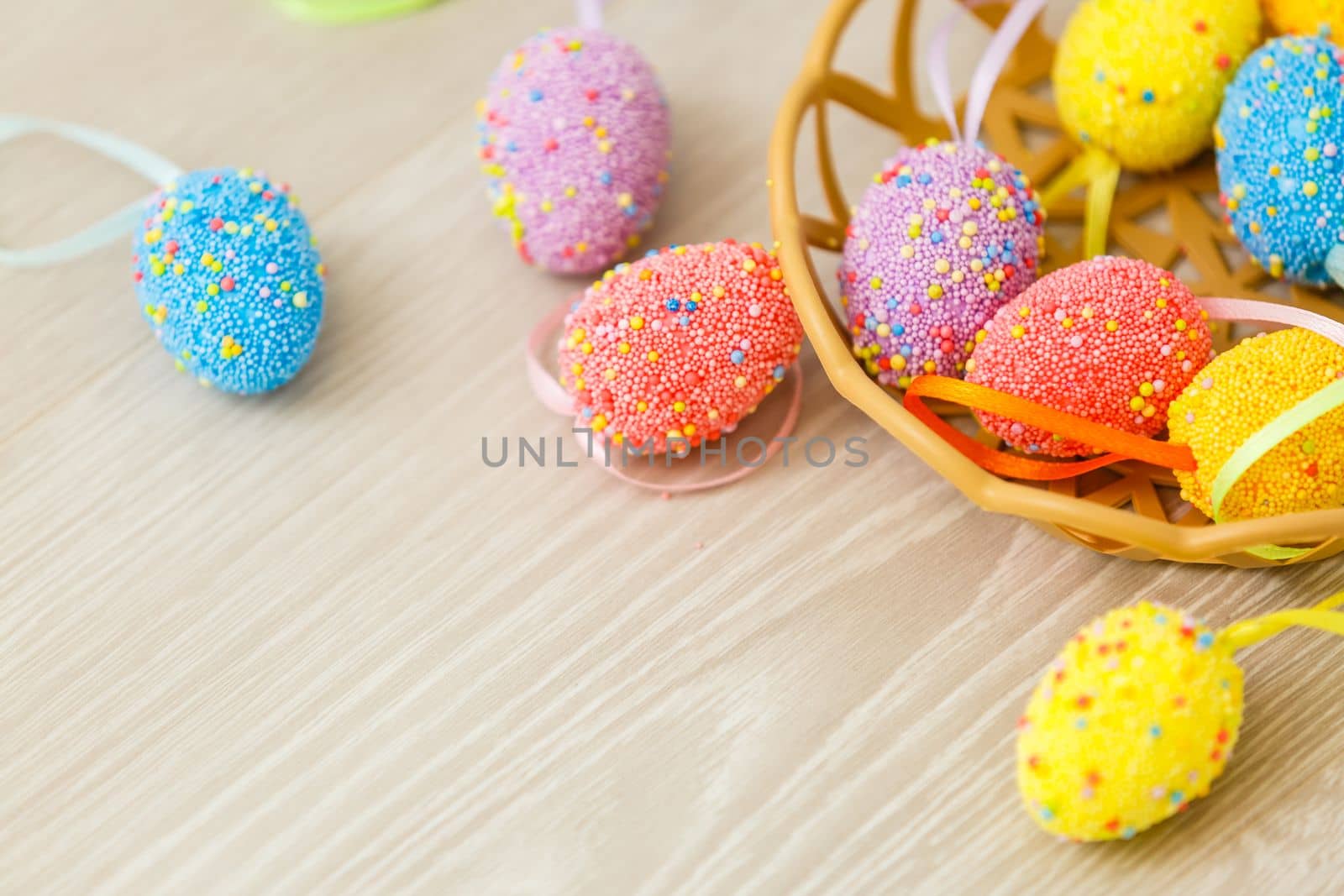 Easter eggs painted in pastel colors on a white background