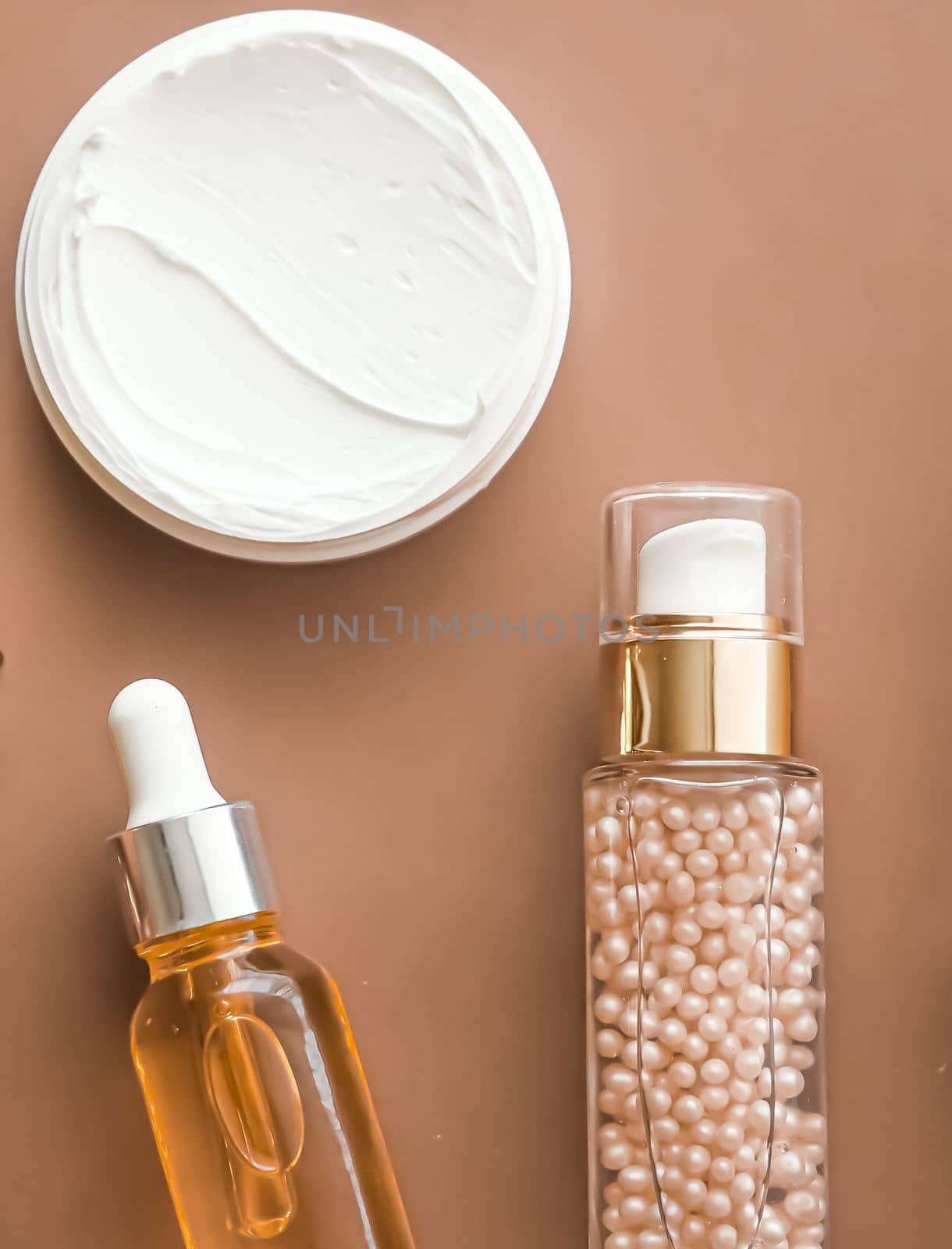 Beauty cosmetics and skincare product on beige background, flatlay by Anneleven