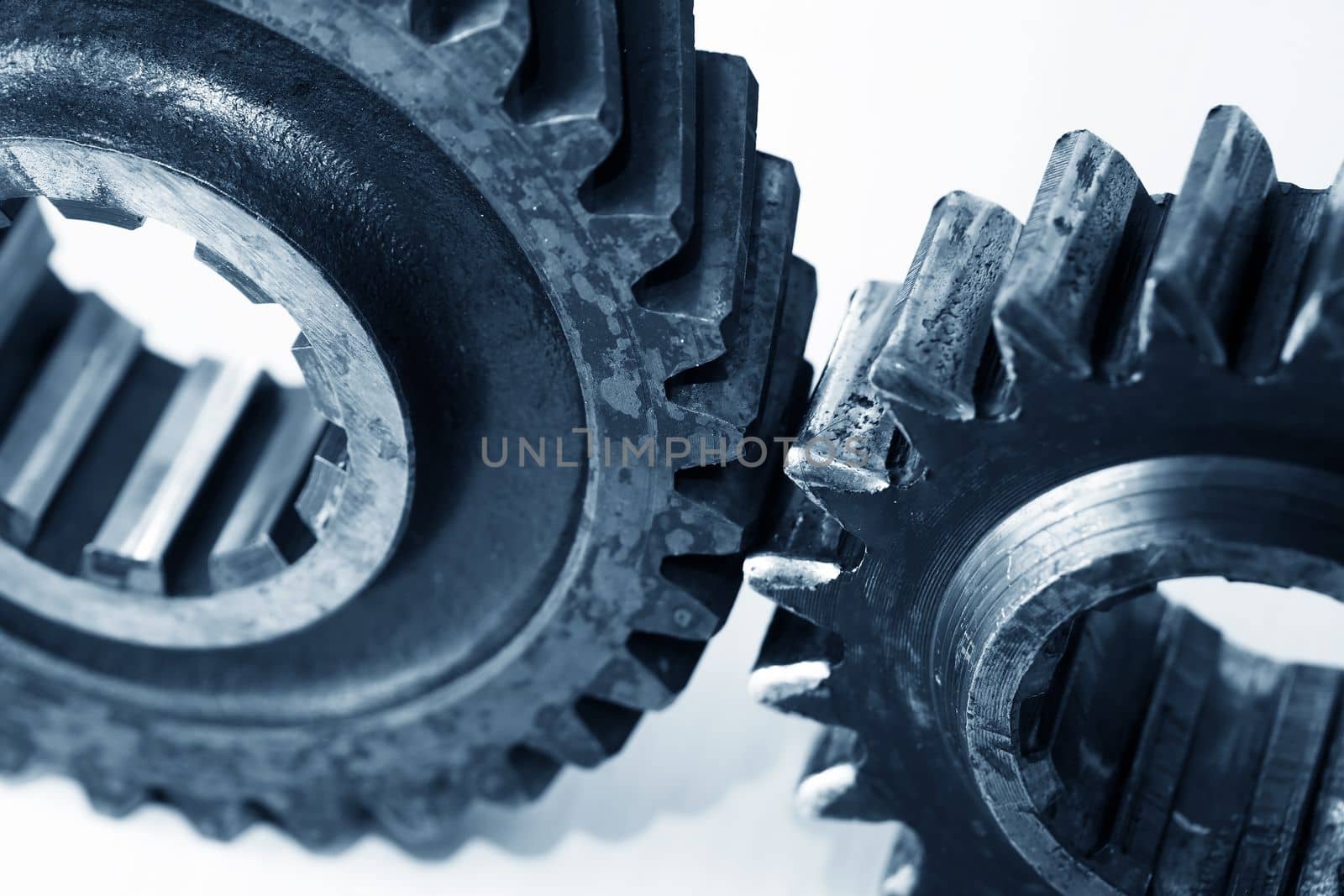 Engineering concept. Extreme closeup of set of old gears