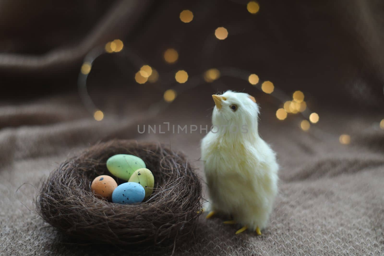 Colorful eggs and yellow chicks. Spring Easter composition. Space for text or design. Easter card or Banner