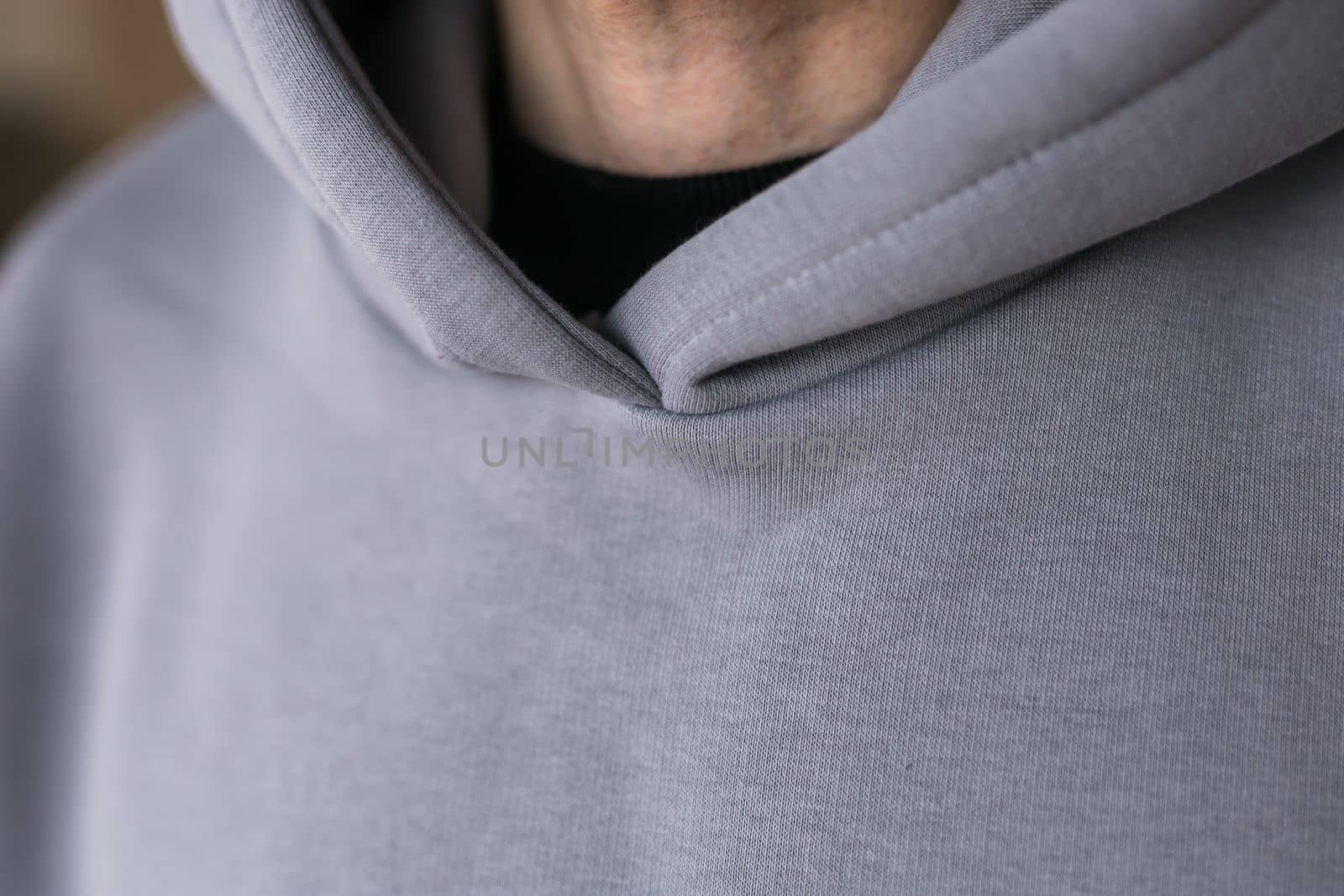 Close-up of cotton sweatshirt fabric texture clothes - design clothes tailoring and youth fashion