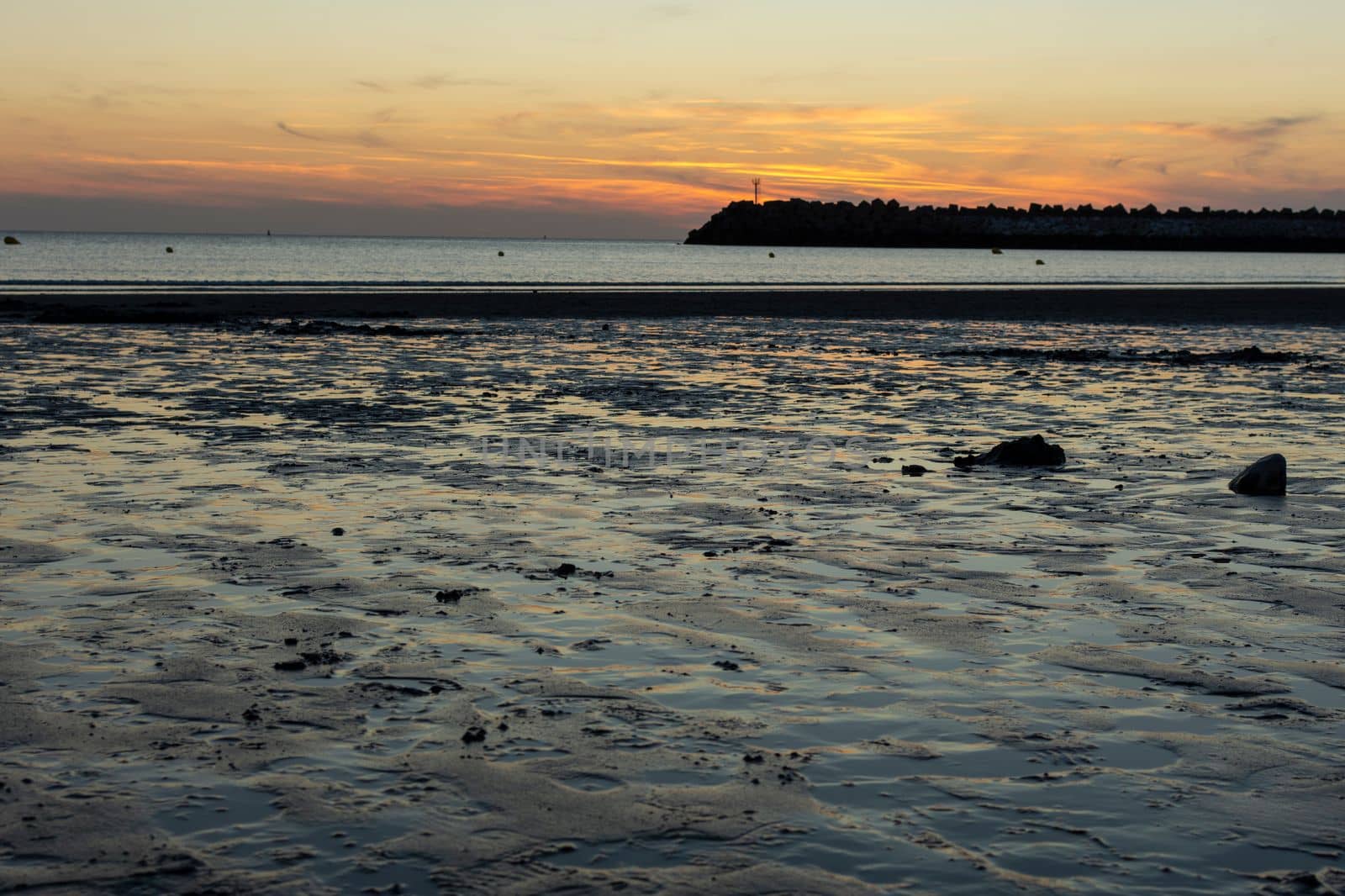 Sandy beach at low tide in the evening. Saint Jouin Bruneval, Normandy, France by scasal15