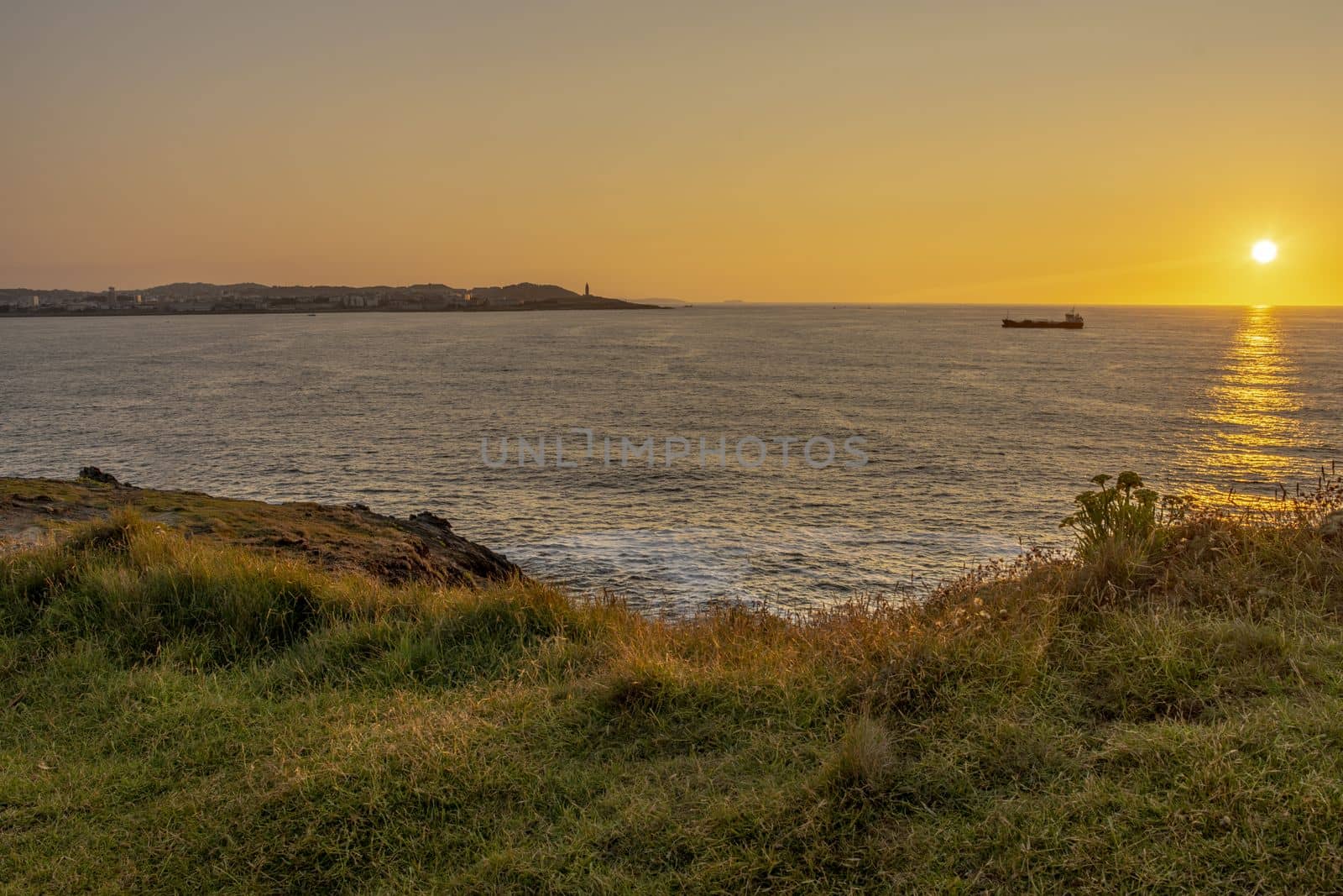 A Coruna sunset with the Atlantic ocean in the background by scasal15