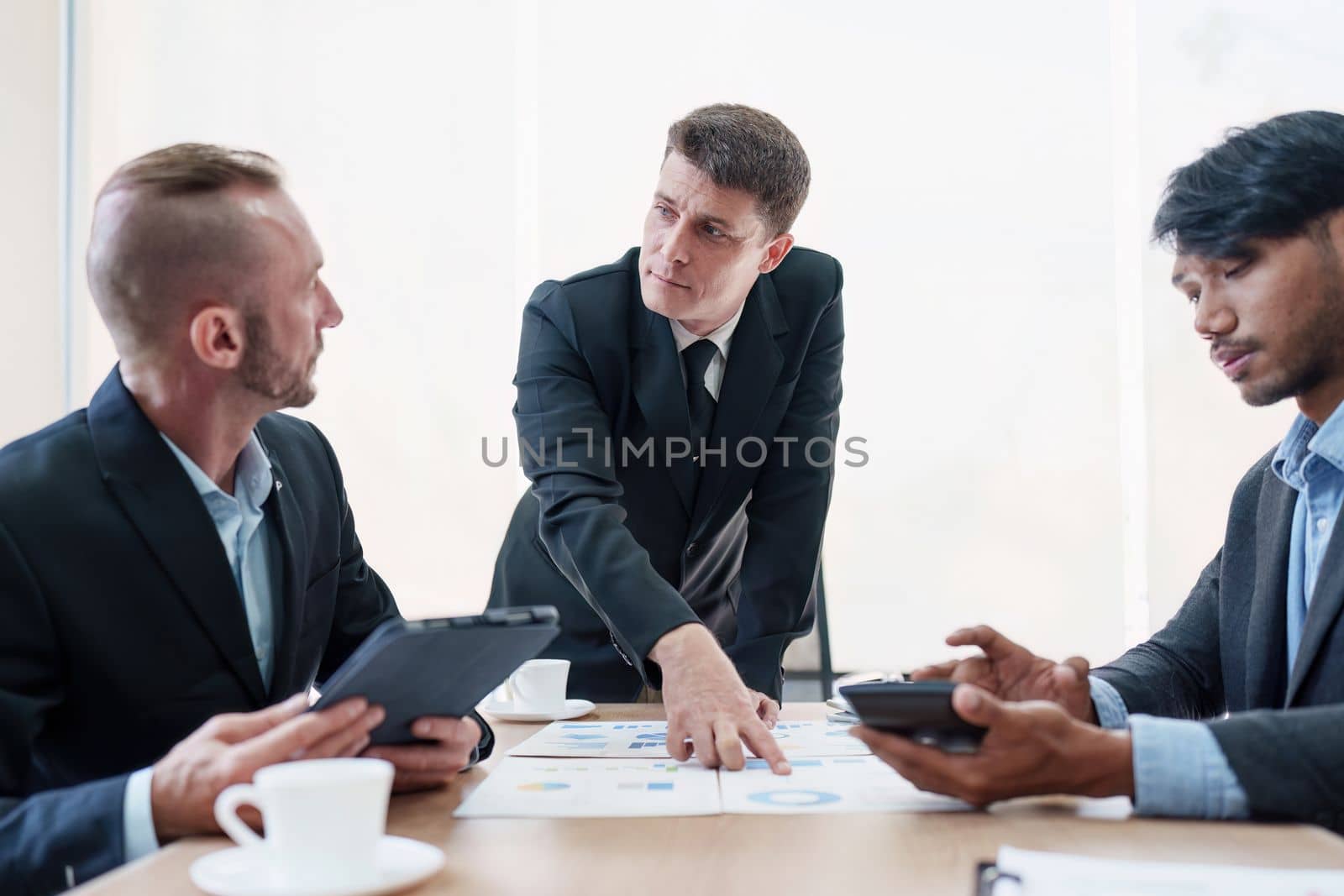 Group of Business financial with finance reports to analyze big data, balance sheet, strategy at meeting room