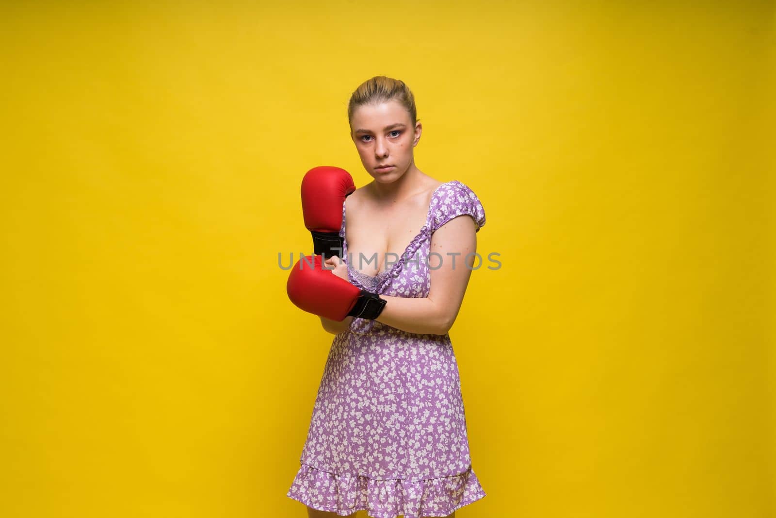 Boxer, seductive confident female boxer with gloves studio, sporty woman posing looking at camera. by Zelenin