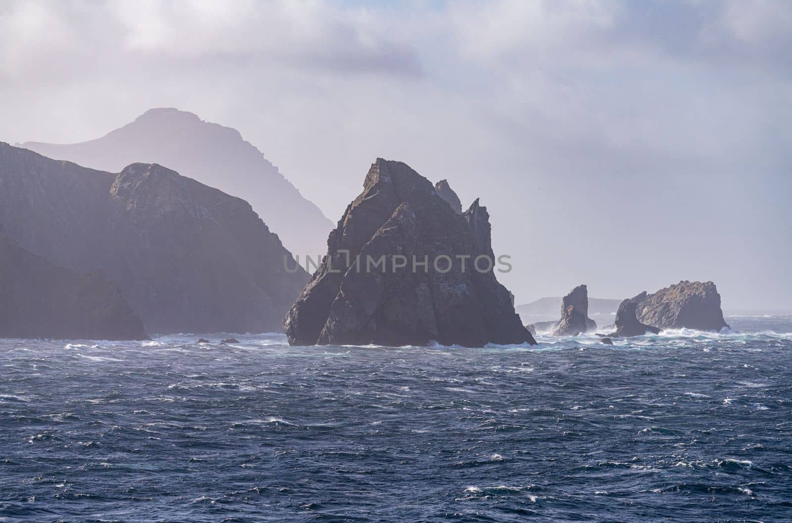 Jagged rocky outcroppings off Hornos Island near Cape Horn in Chile