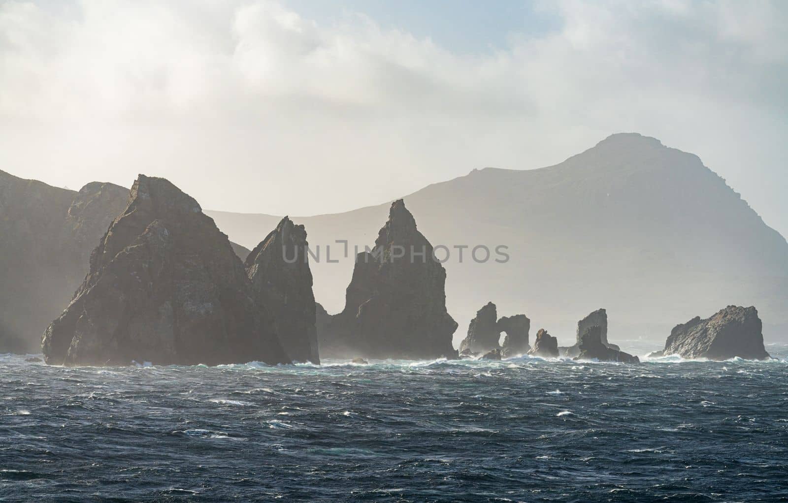 Jagged rocky outcroppings off Hornos Island near Cape Horn in Chile