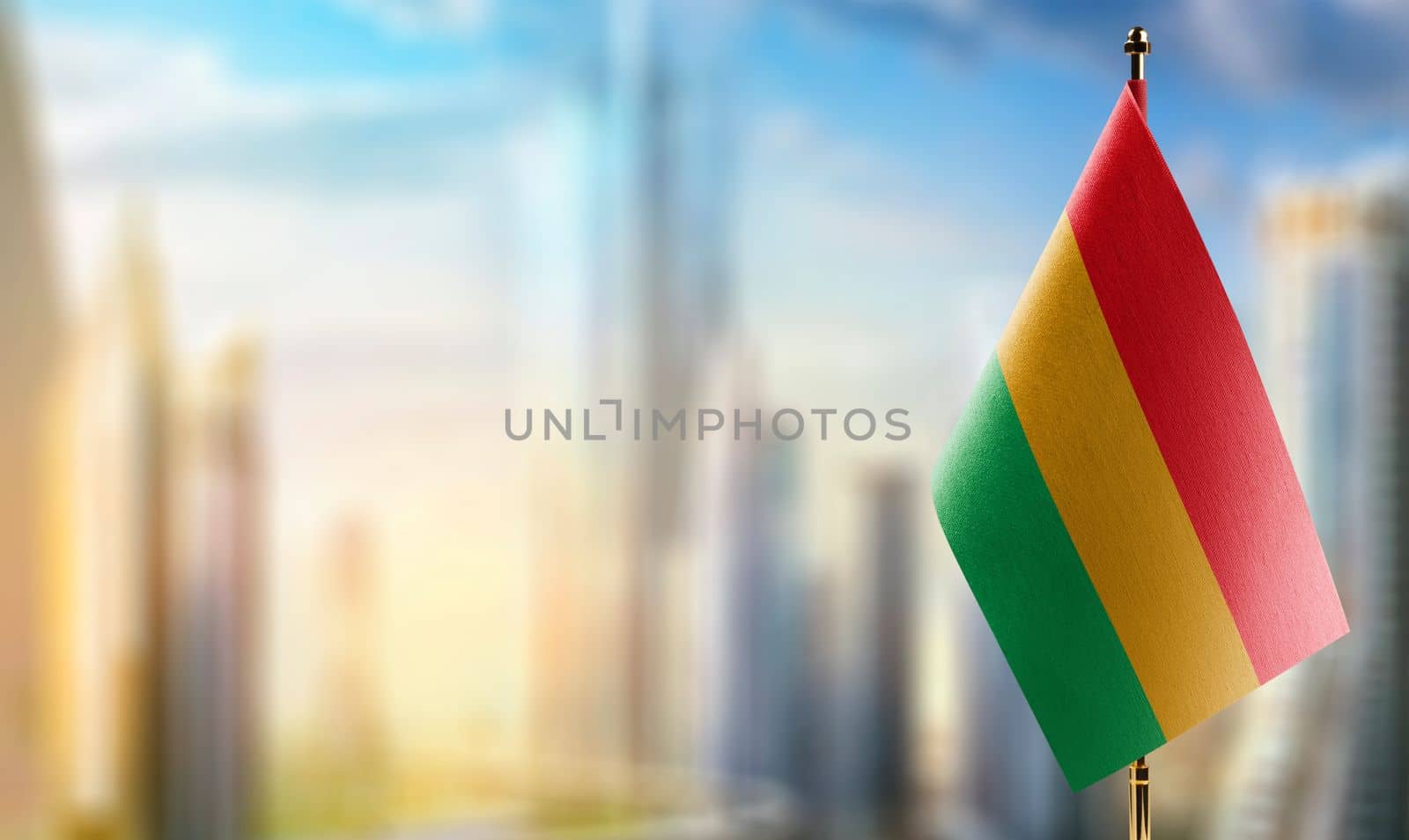 Small flags of the Bolivia on an abstract blurry background by butenkow