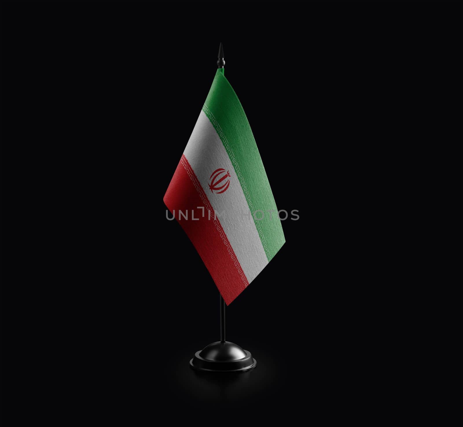 Small national flag of the Iran on a black background by butenkow