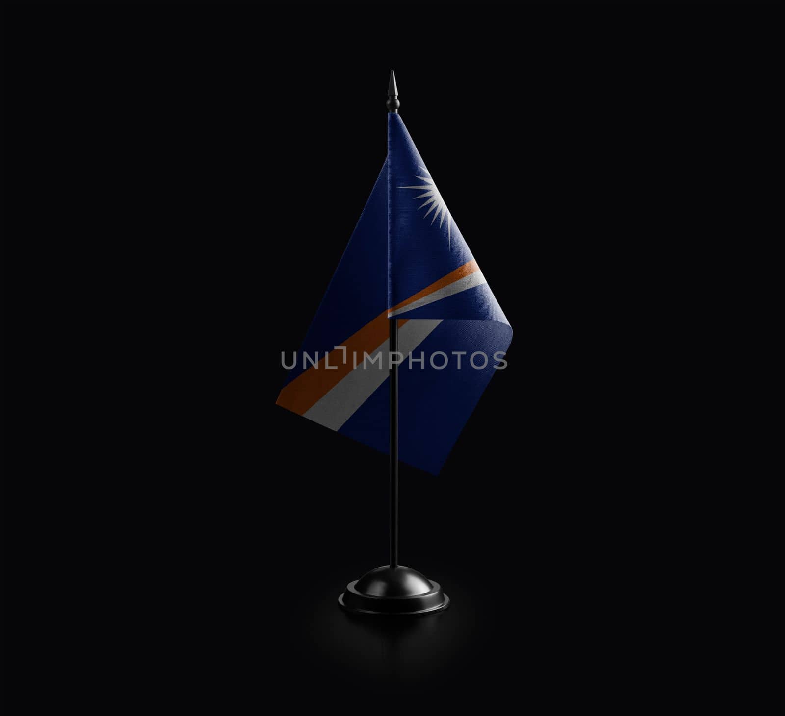 Small national flag of the Marshall on a black background.