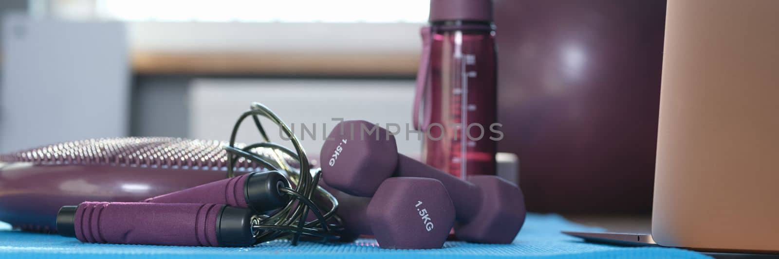 Gym equipment for training at home closeup. Fitness items for training healthy lifestyle concept