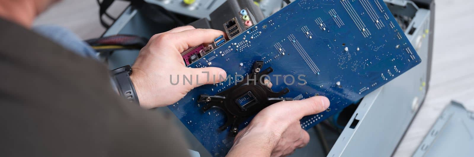 Computer repair, personal computer assembly and PC assembly. Open system unit prepared for repair concept