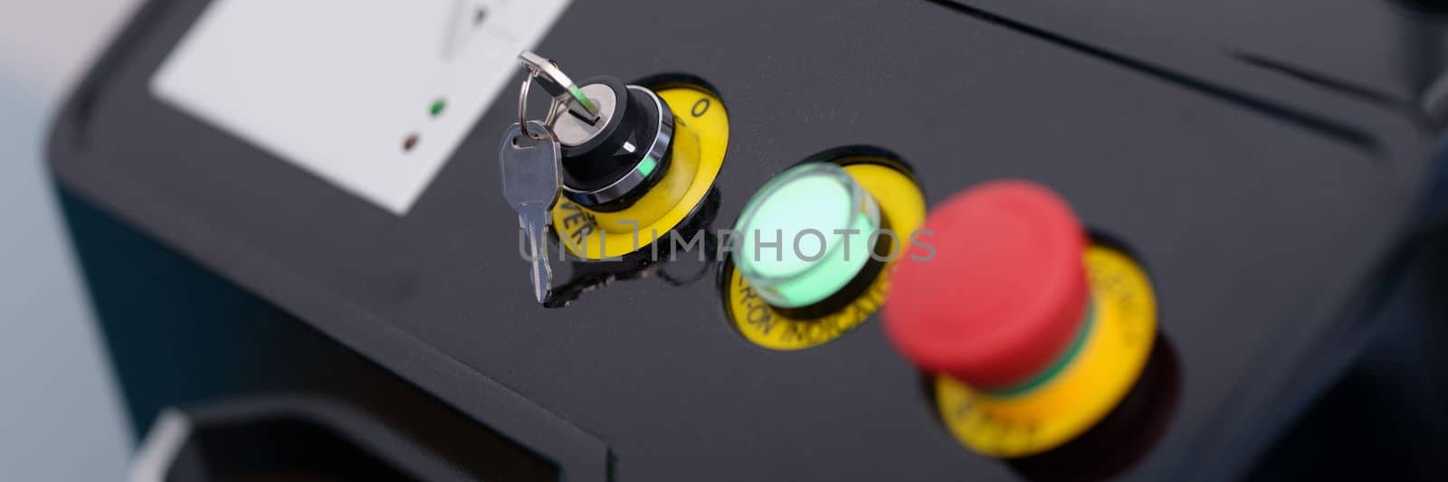 Buttons with key on laser hair removal and blood vessel and acne treatment machine closeup by kuprevich