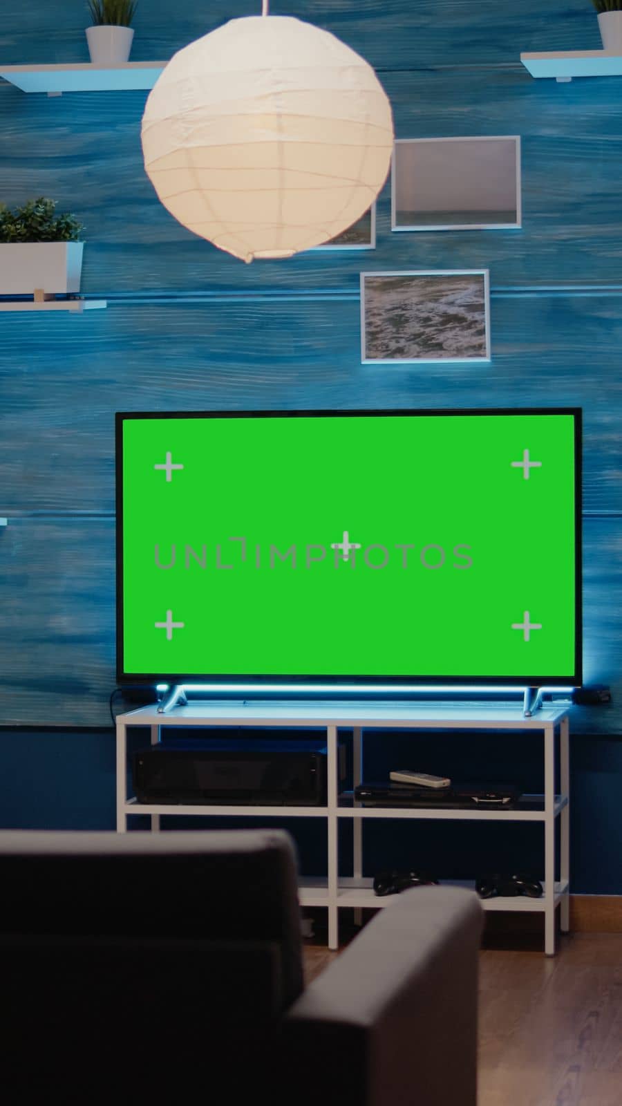 Nobody in living room with green screen display by DCStudio