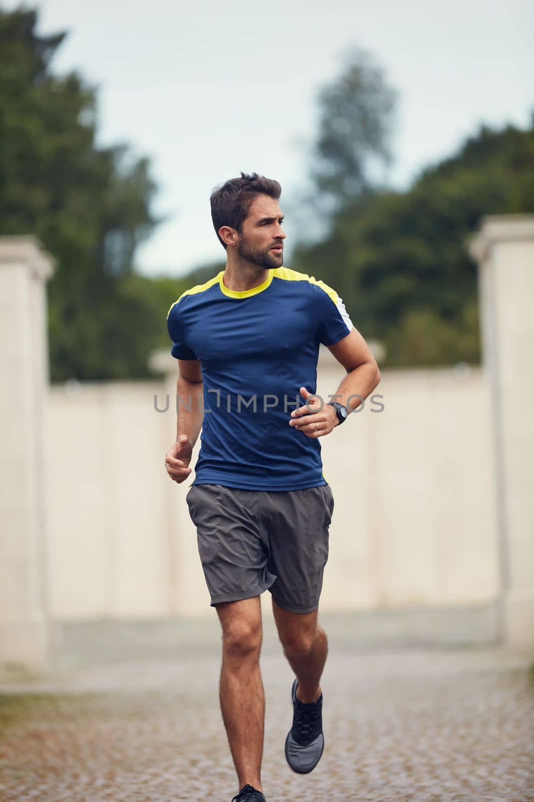 Your excuses are just not valid. a sporty man running outdoors