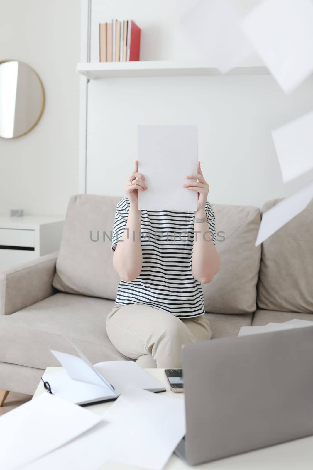 businesswoman holding papers preparing report analyzing work results, female executive doing paperwork at workplace. copy space, data analysis by paralisart