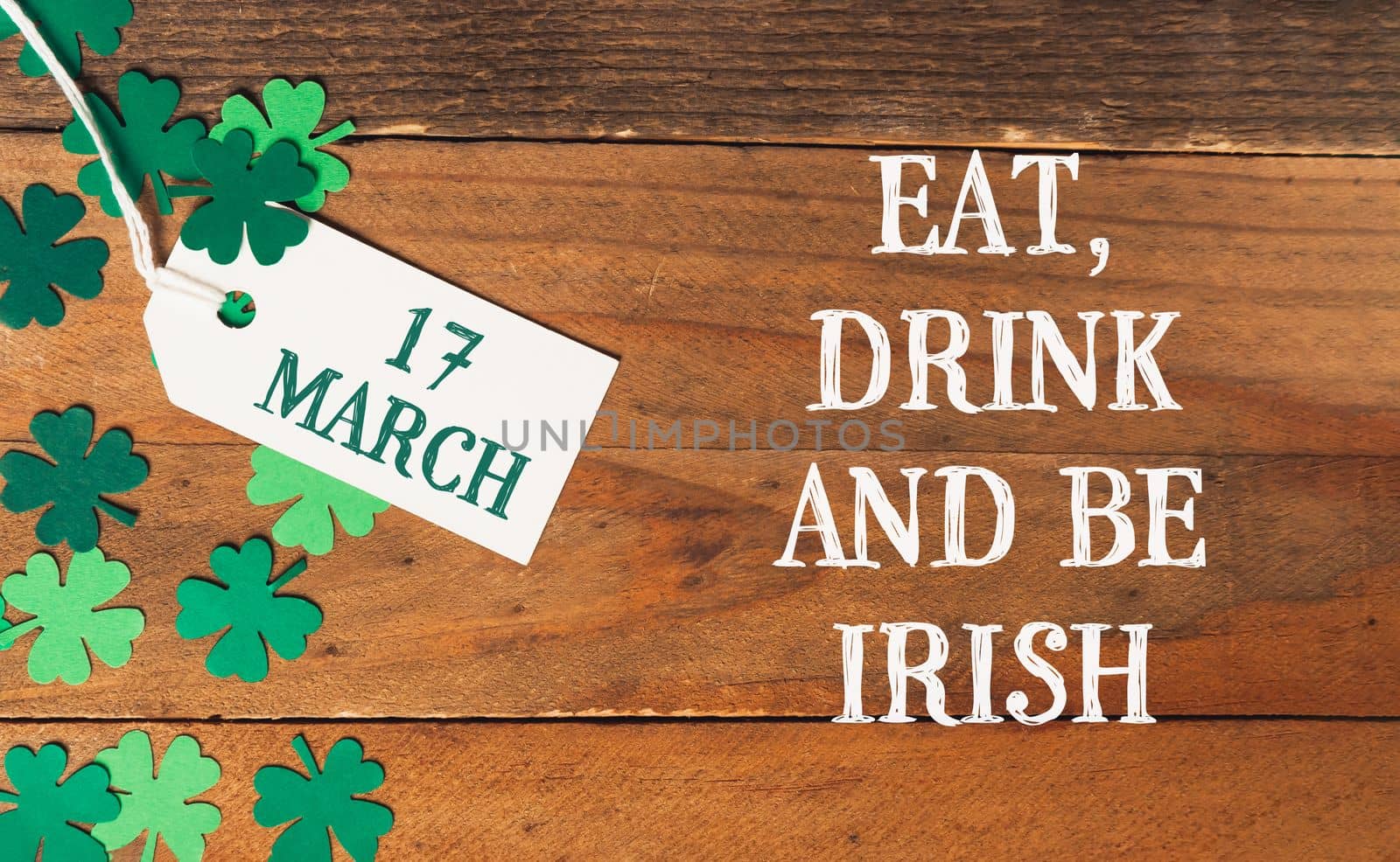 17 March St. Patrick's day. Eat, drink and be Irish on wooden background
