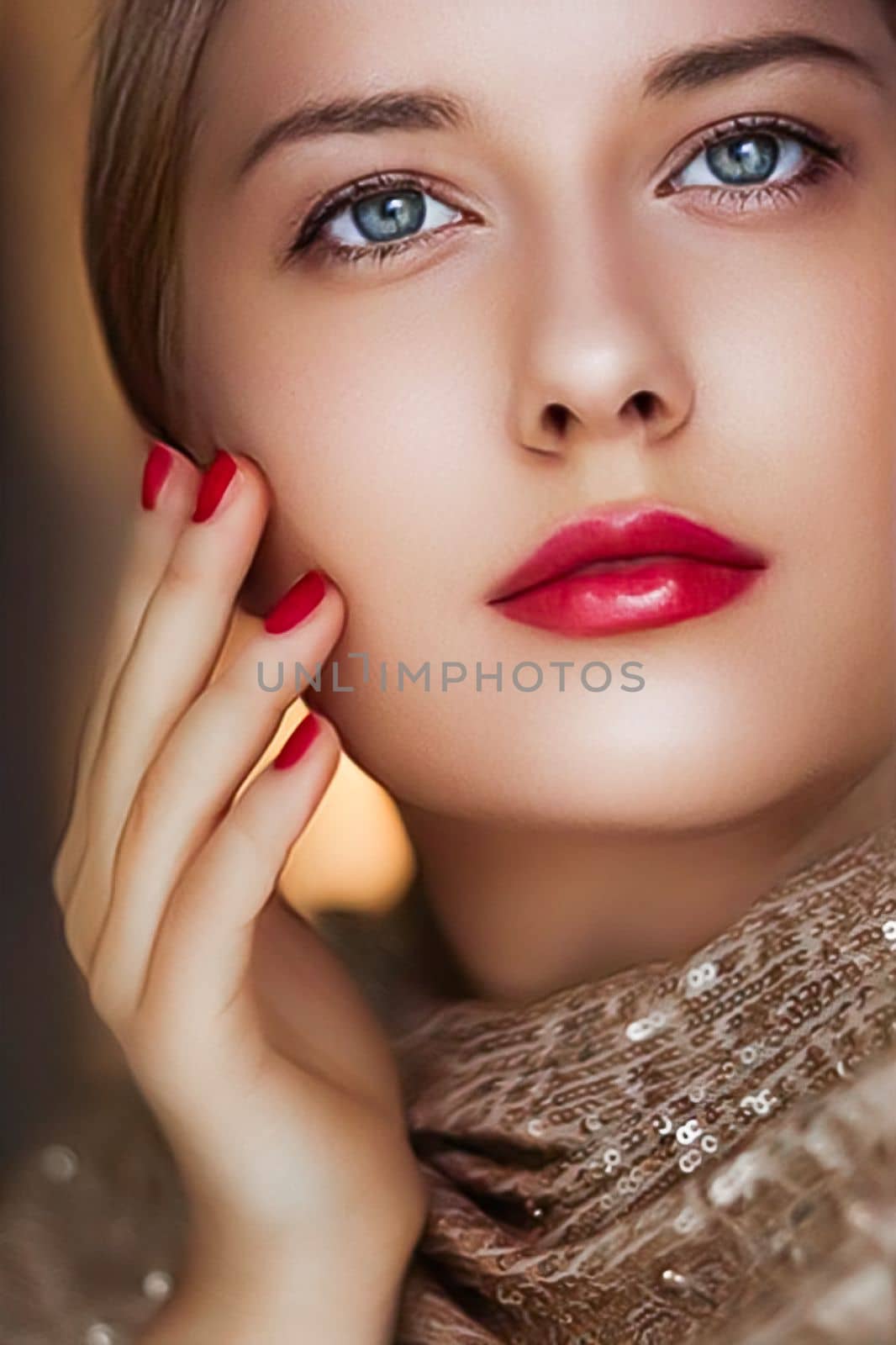 Beauty, makeup and glamour, face portrait of beautiful woman with manicure and red lipstick make-up wearing gold for luxury cosmetics, style and fashion look