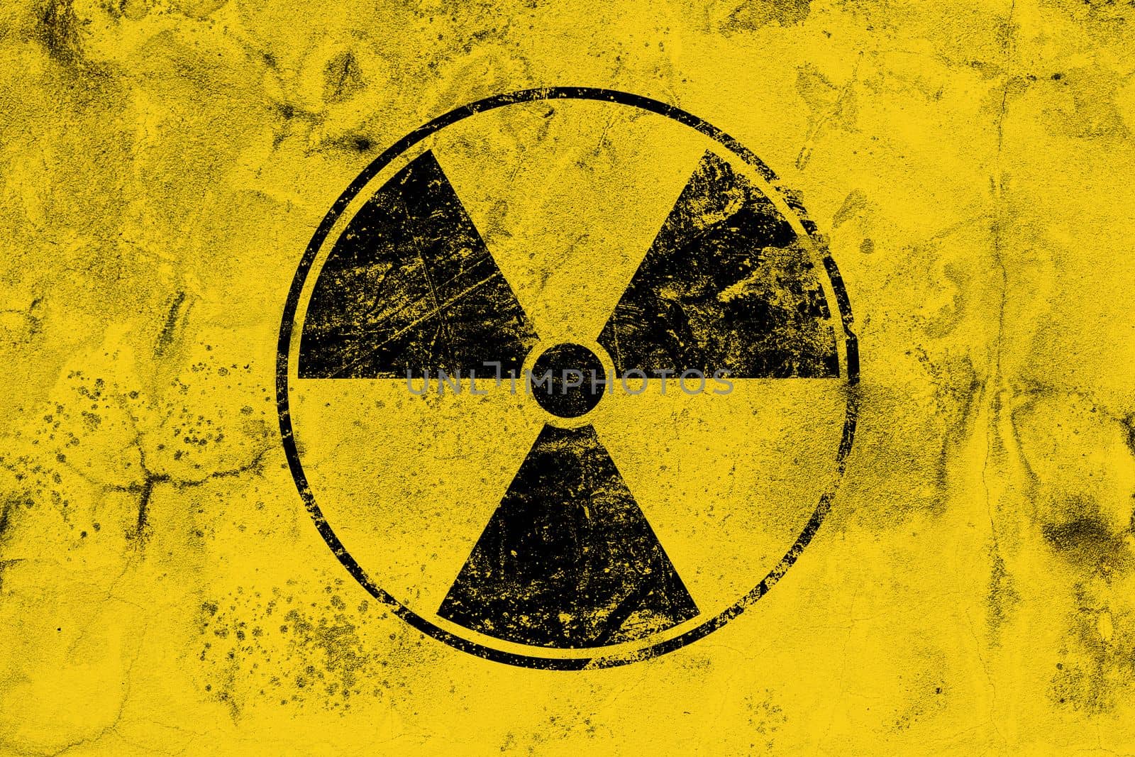 Black radioactive sign over yellow background by BreakingTheWalls