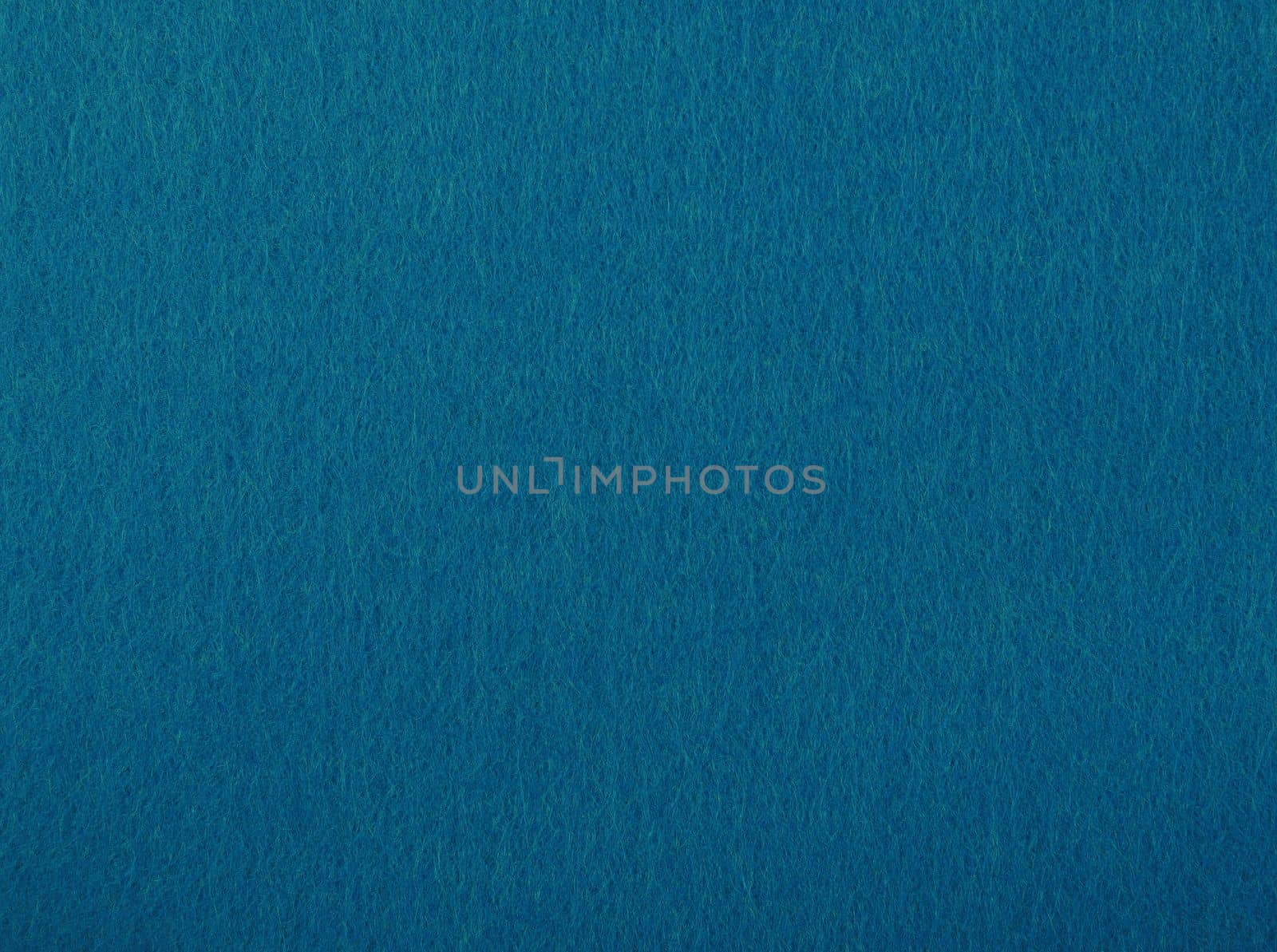 Blue felt textile material background texture, close up