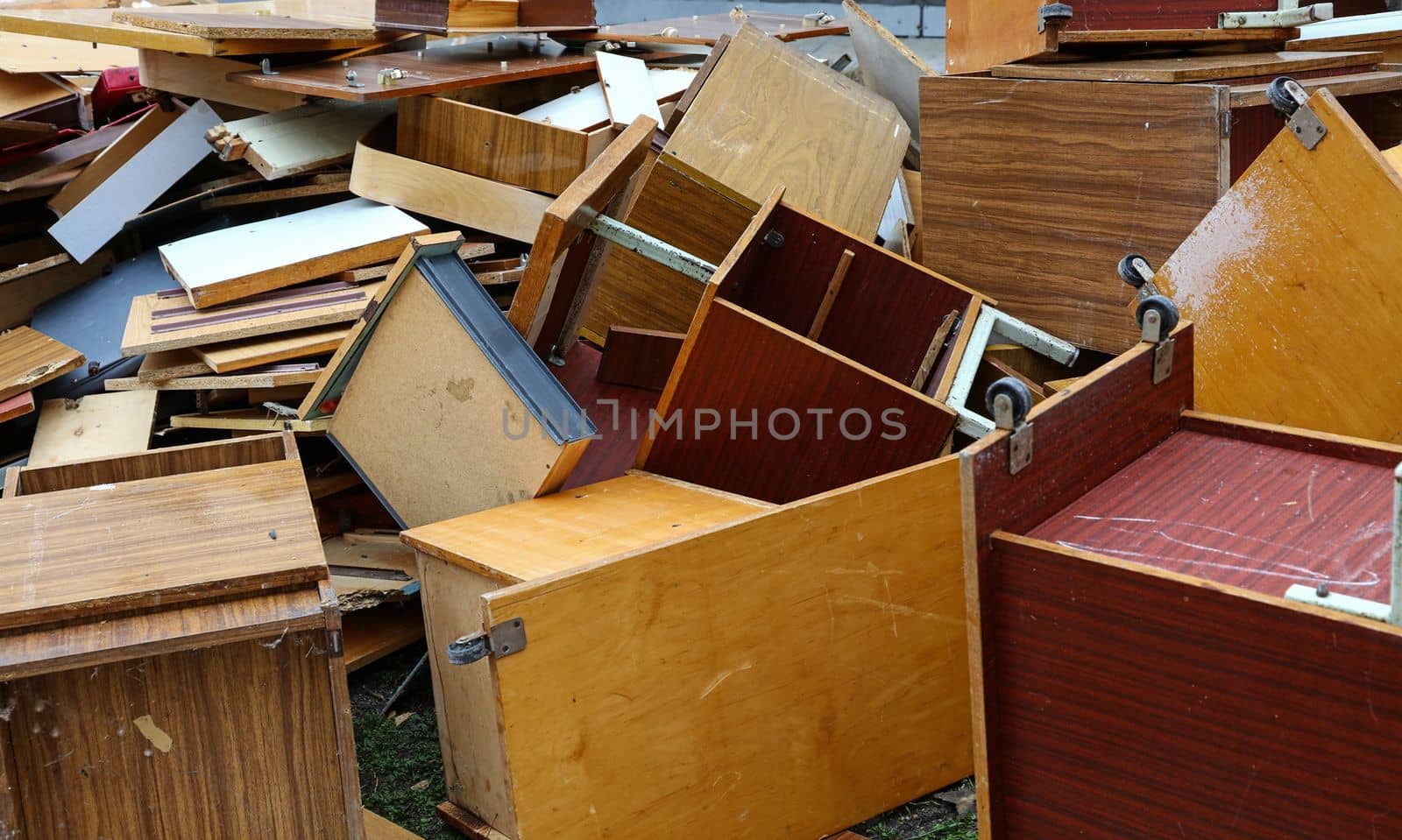 Old broken wooden furniture on waste dump site by BreakingTheWalls