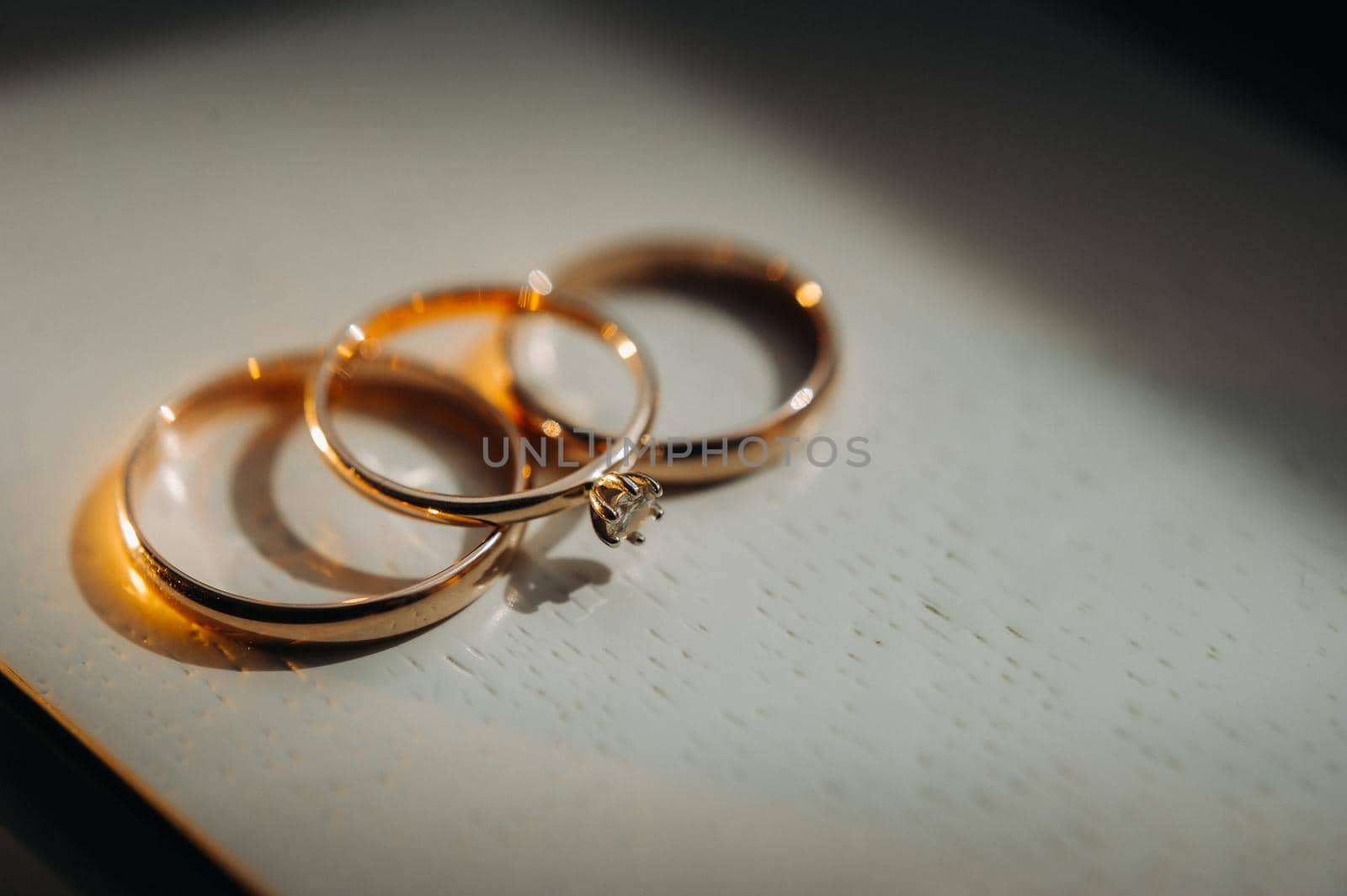 Close-up of two gold wedding rings for a wedding.