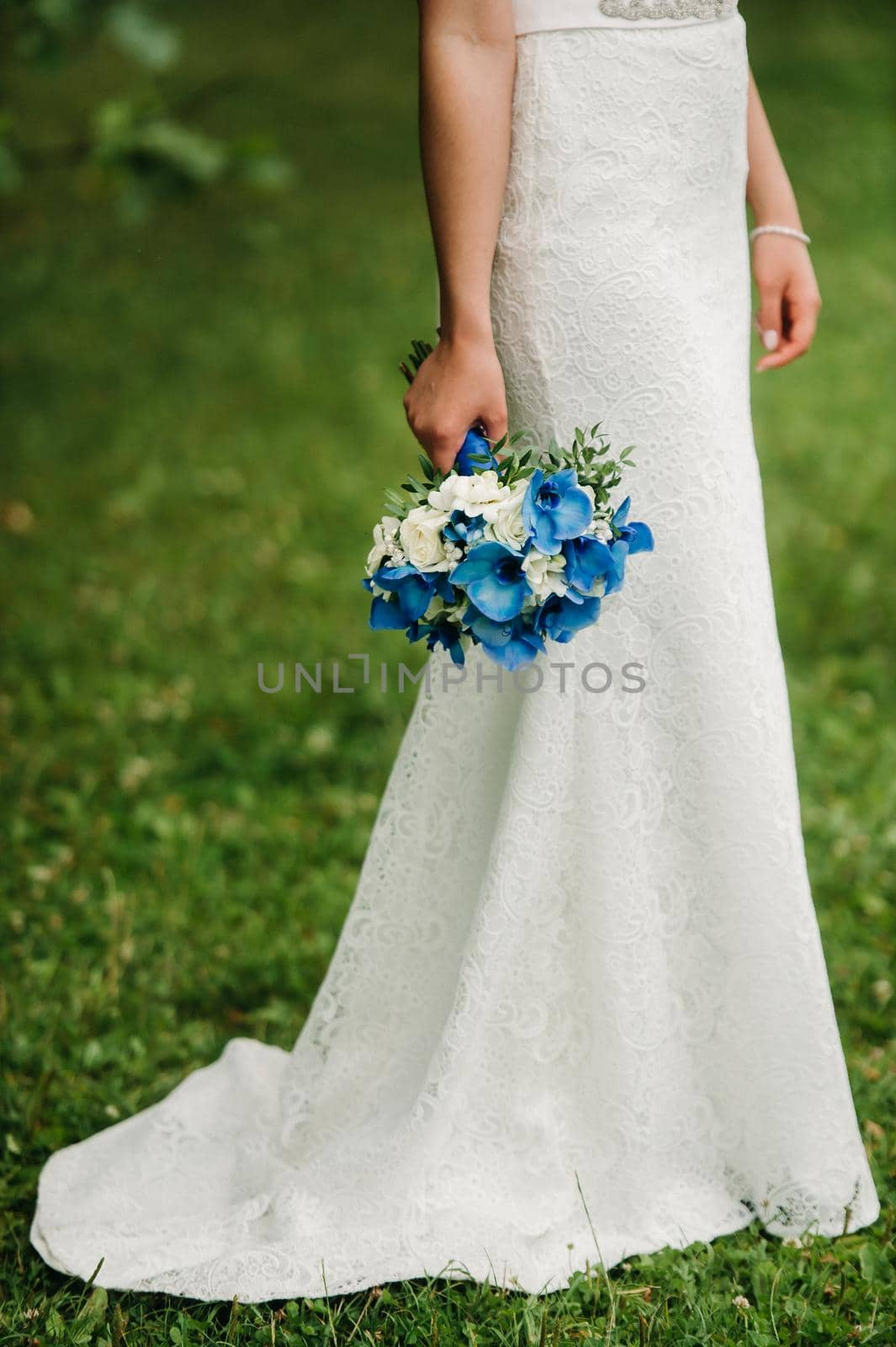 wedding bouquet in the hands of the bride .Morning of the Bride.