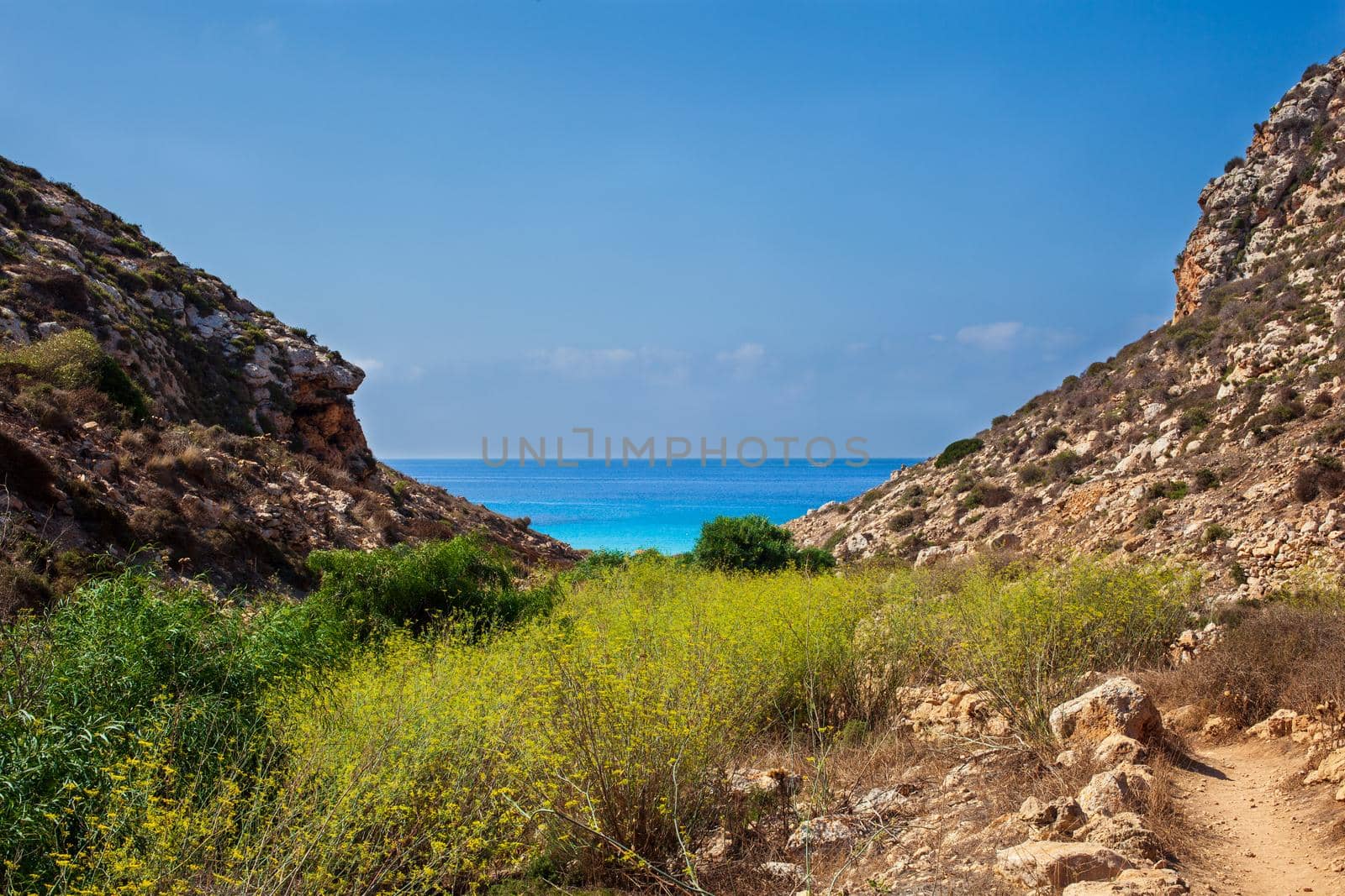 View of Cala Pulcino famous sea place of Lampedusa, Sicily