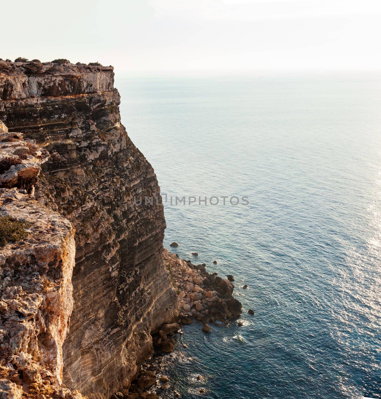 View of the scenic cliff coast of Lampedusa, Sicily