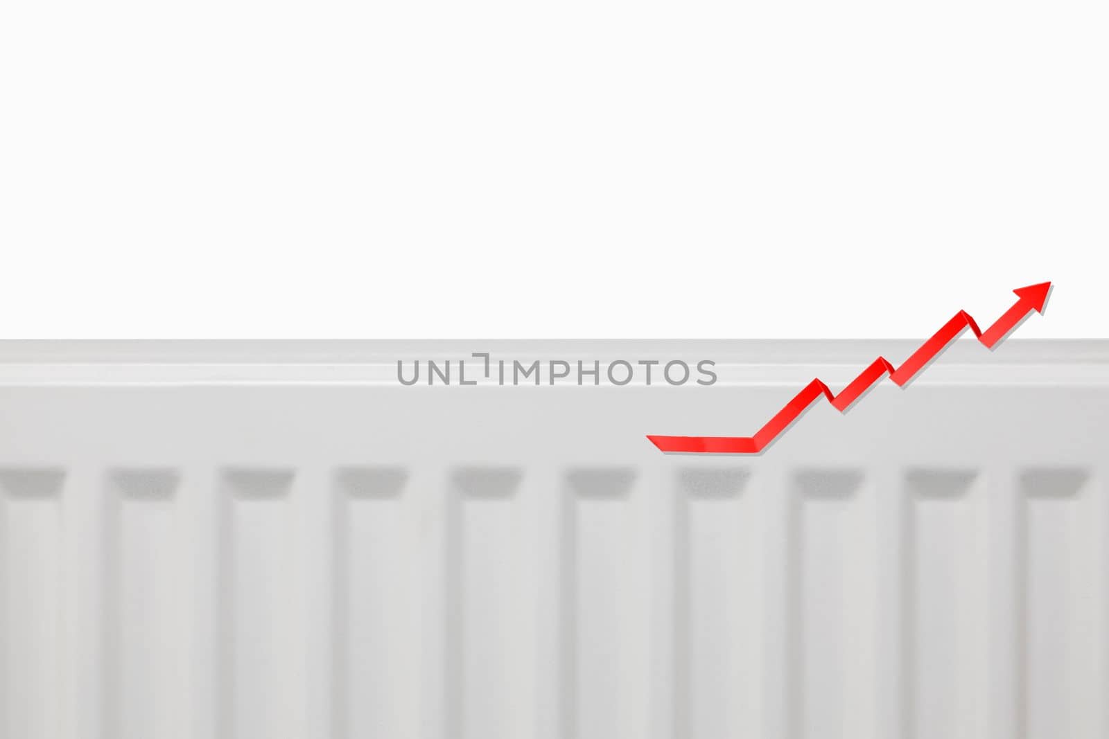 Increasing energy bills. Rising red arrow on a heating radiator. Cost of living crisis. recession inflation concept copy space close up
