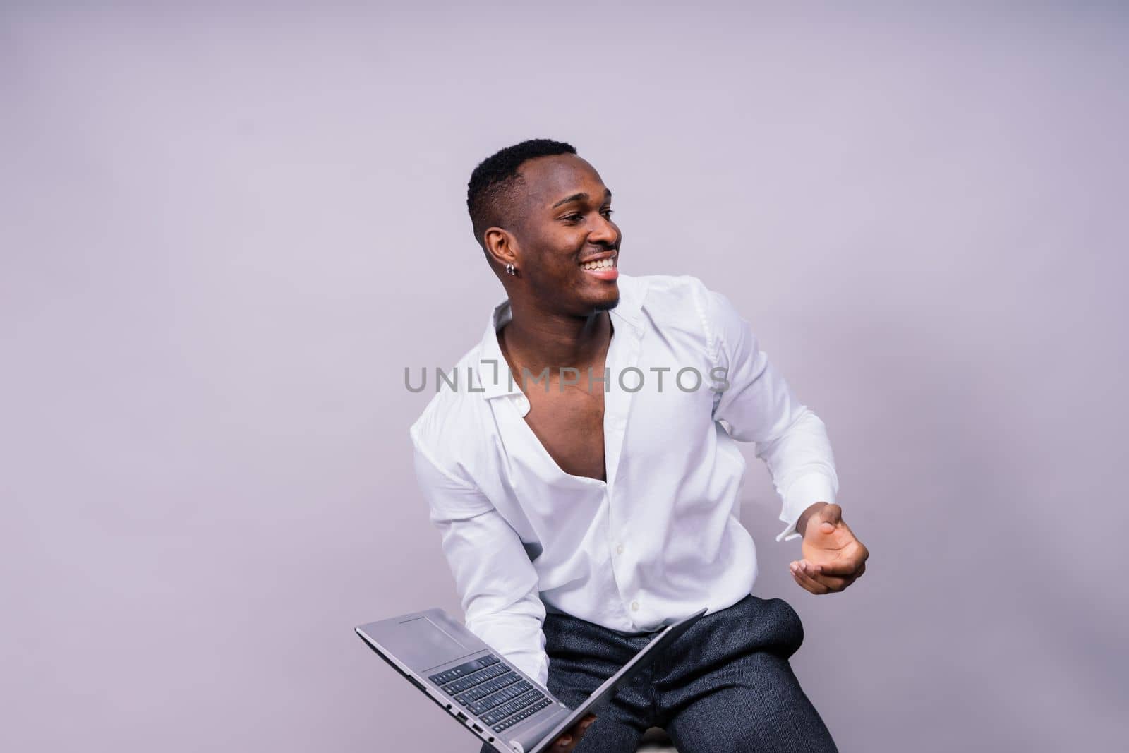 African American millennial businessman isolated on studio background, successful male formal suit by Zelenin