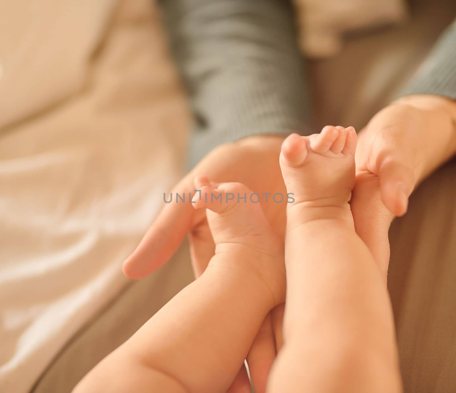 The smallest feet leave the biggest footprints in our hearts. an unidentifiable mother holding her babys feet