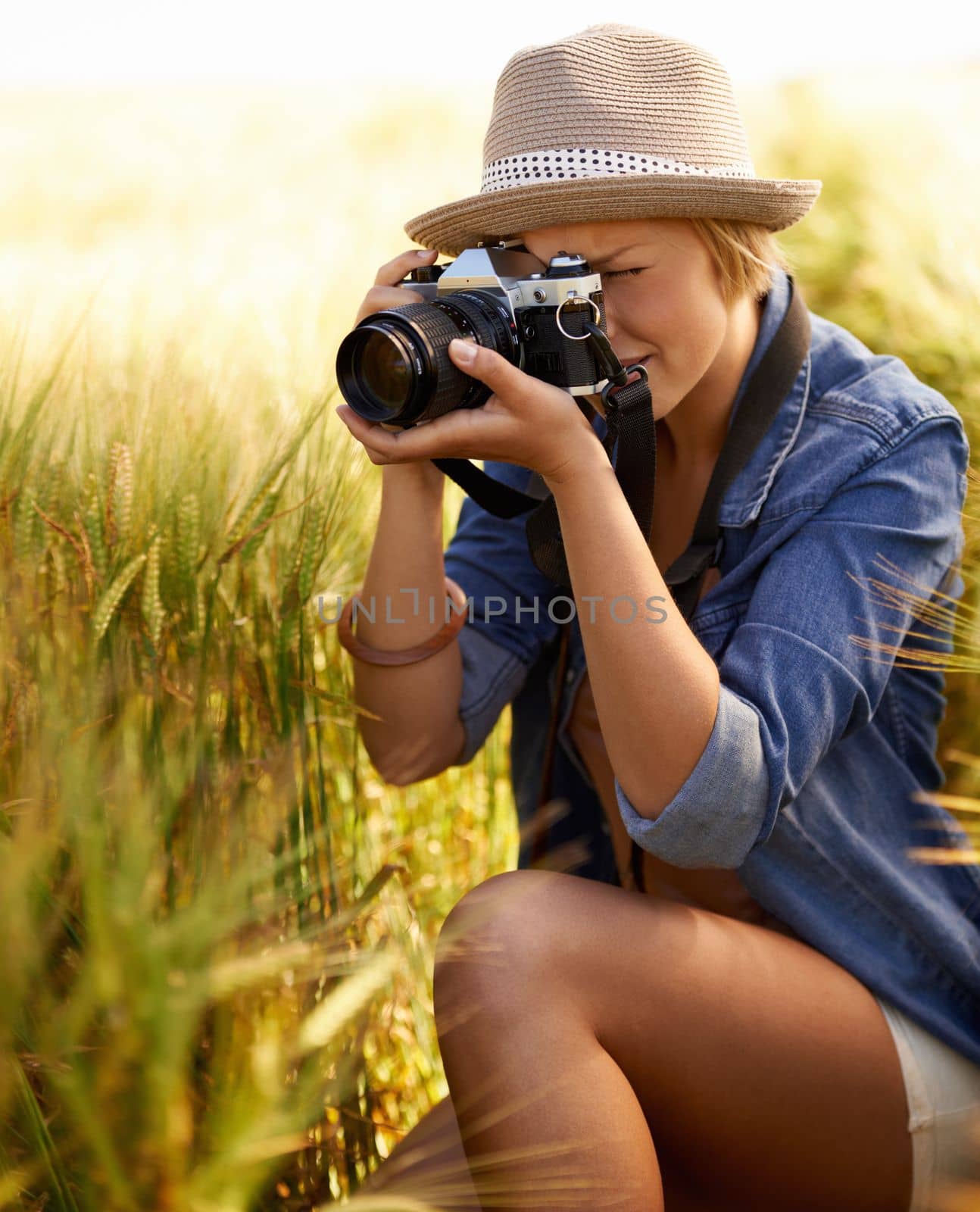 Fascinated by nature. an attractive young woman outdoors on a summer day