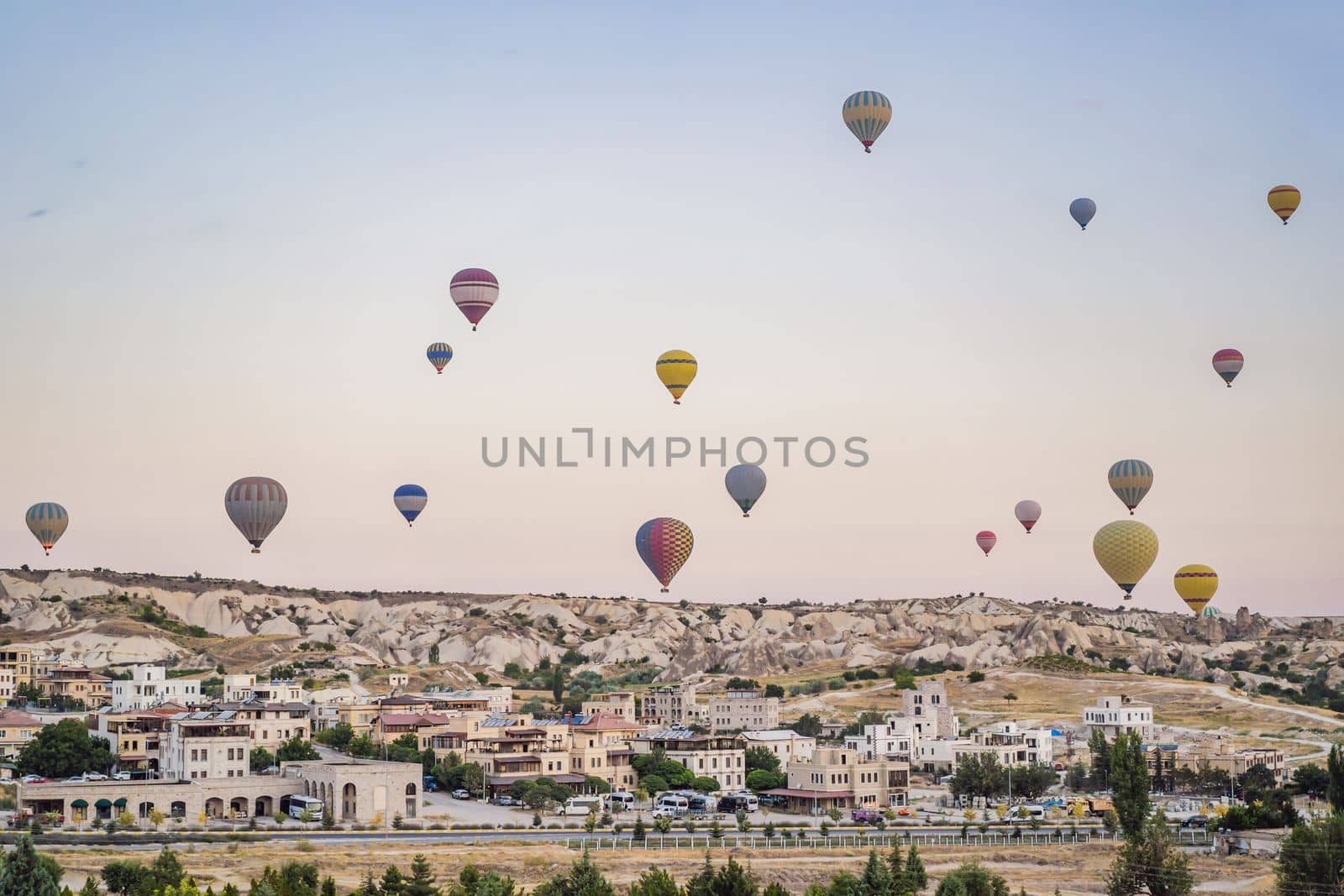 Colorful hot air balloon flying over Cappadocia, Turkey.