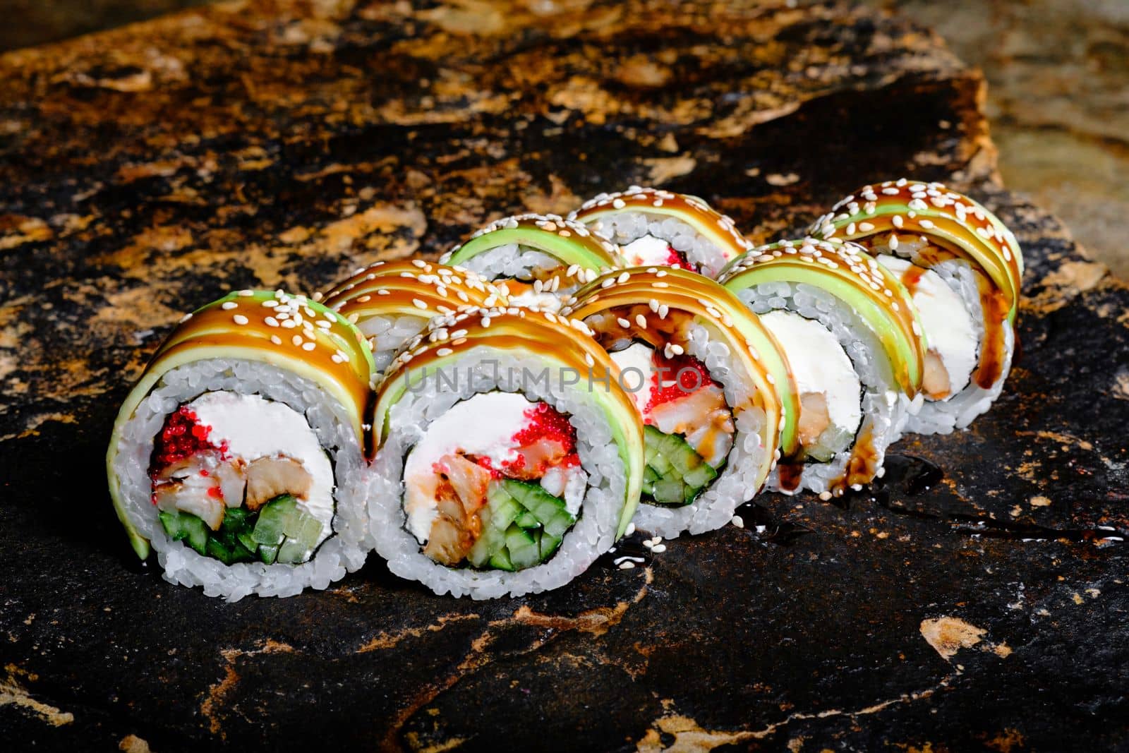 Delicious Sushi Roll on a stone Plate by Symonenko