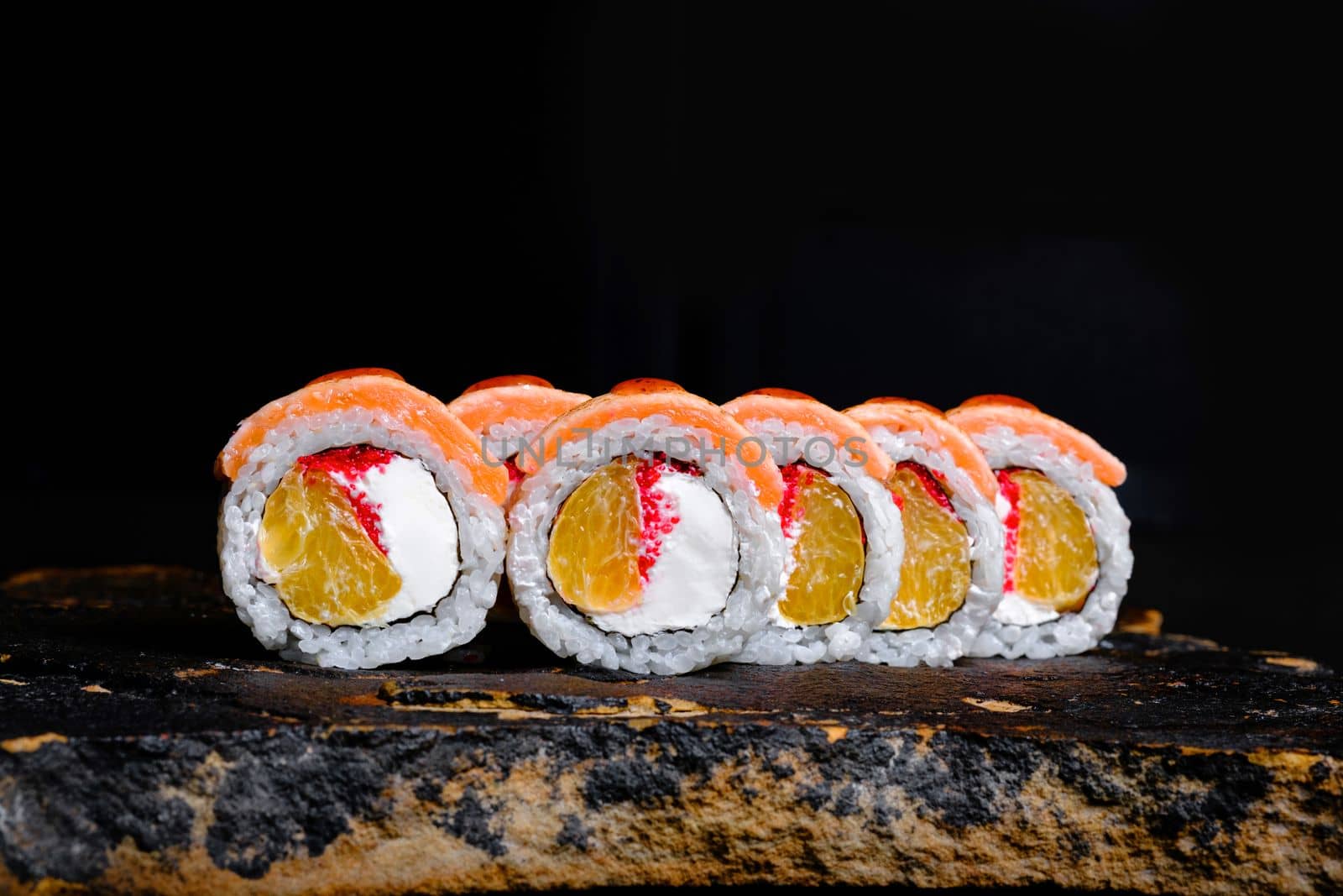 Delicious Sushi Roll on a stone Plate by Symonenko