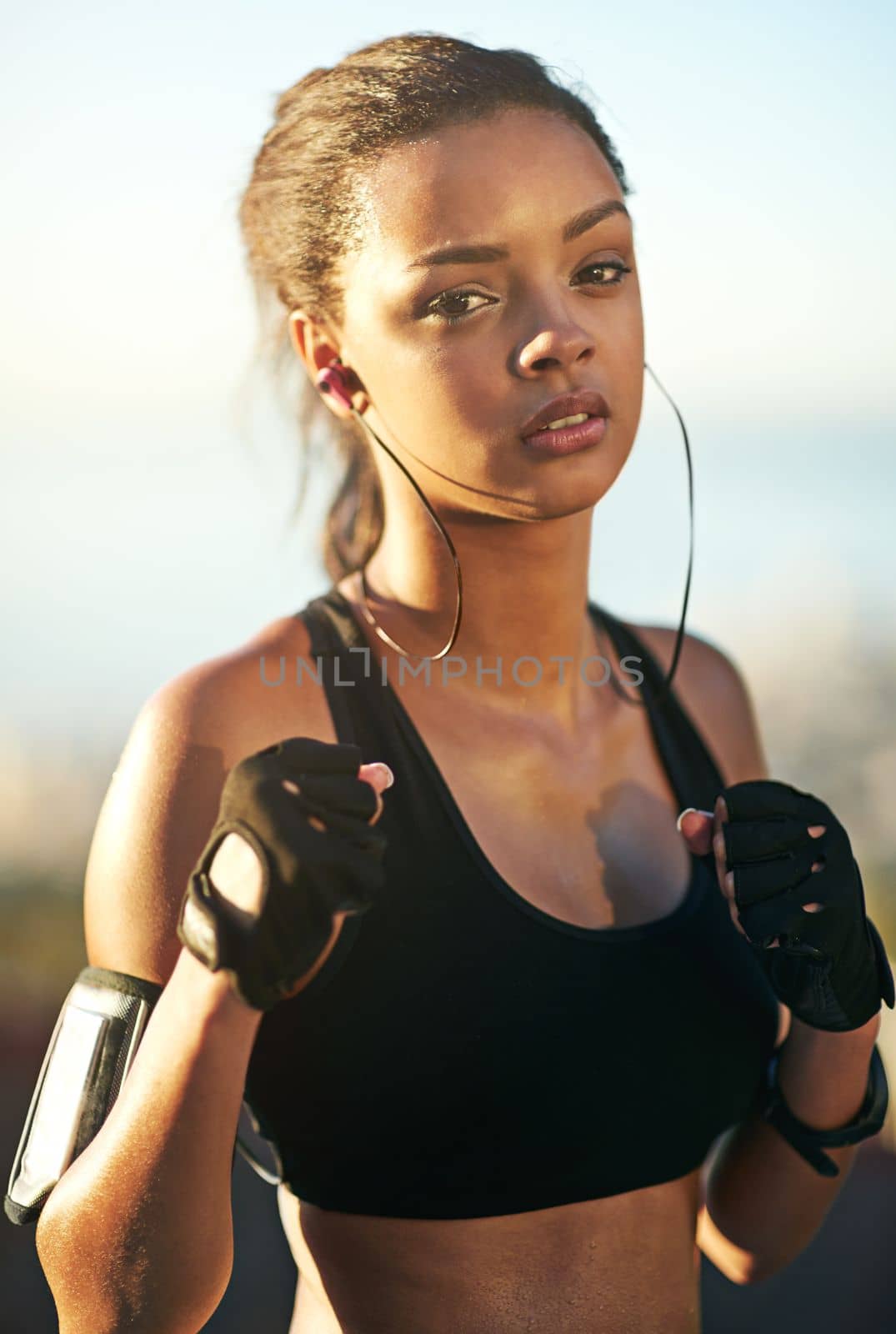 Im ready to rumble. a young woman exercising outdoors