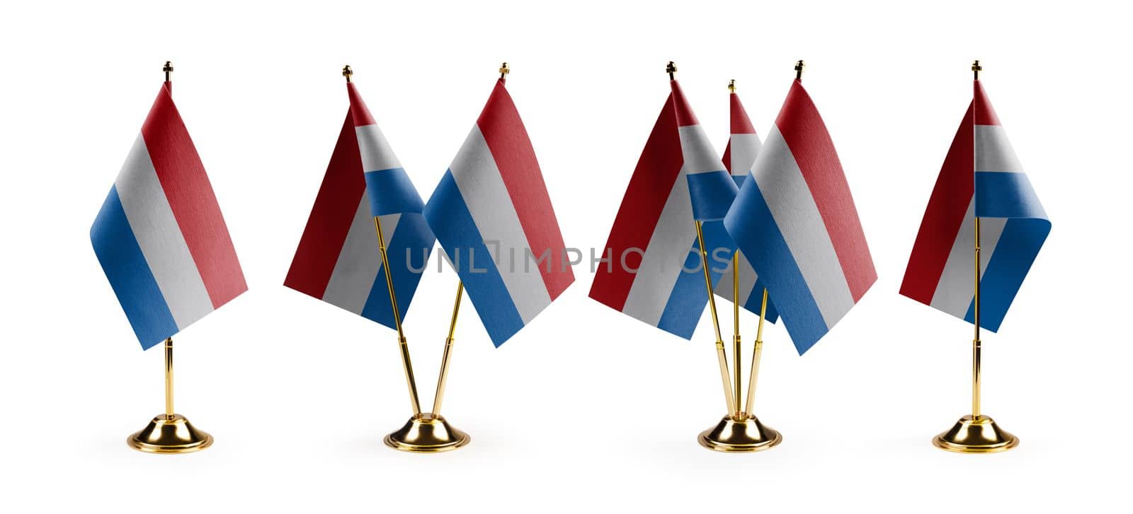 Small national flags of the Netherlands on a white background.