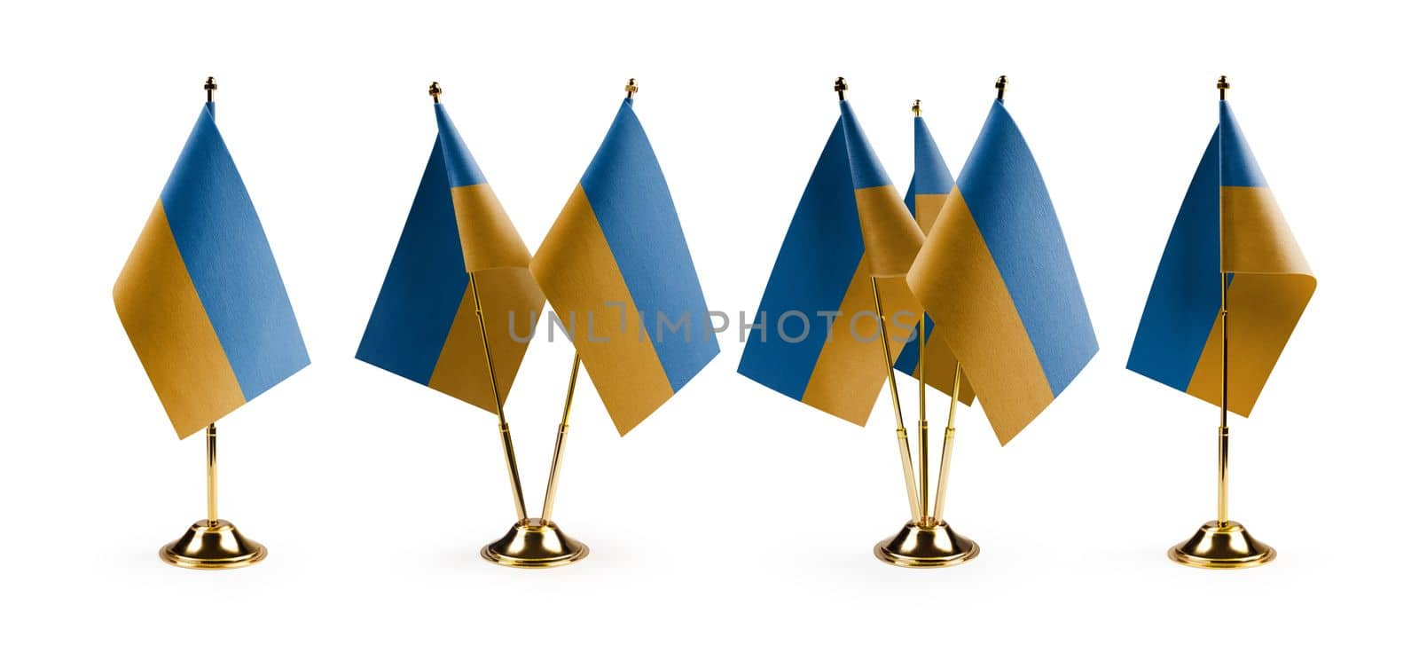 Small national flags of the Ukraine on a white background by butenkow