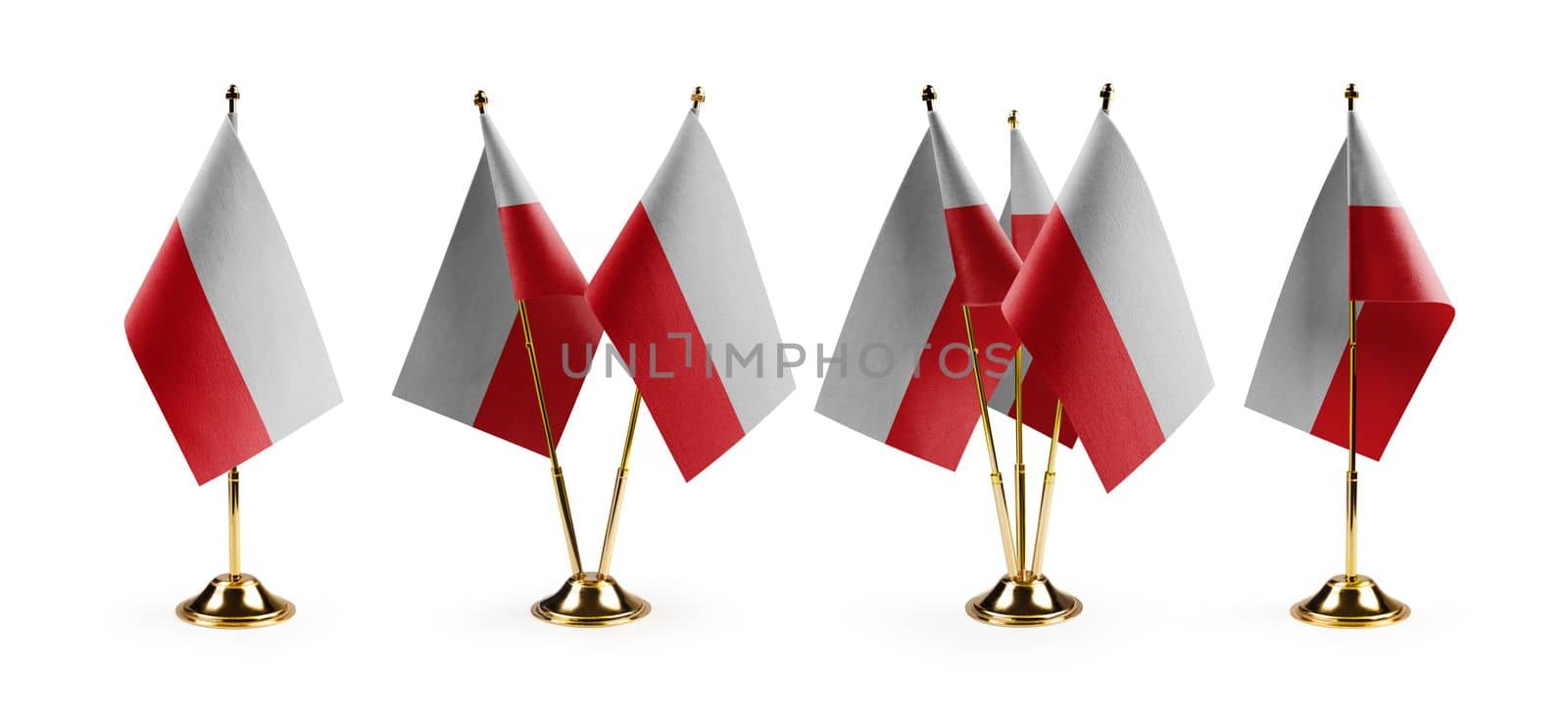 Small national flags of the Poland on a white background by butenkow