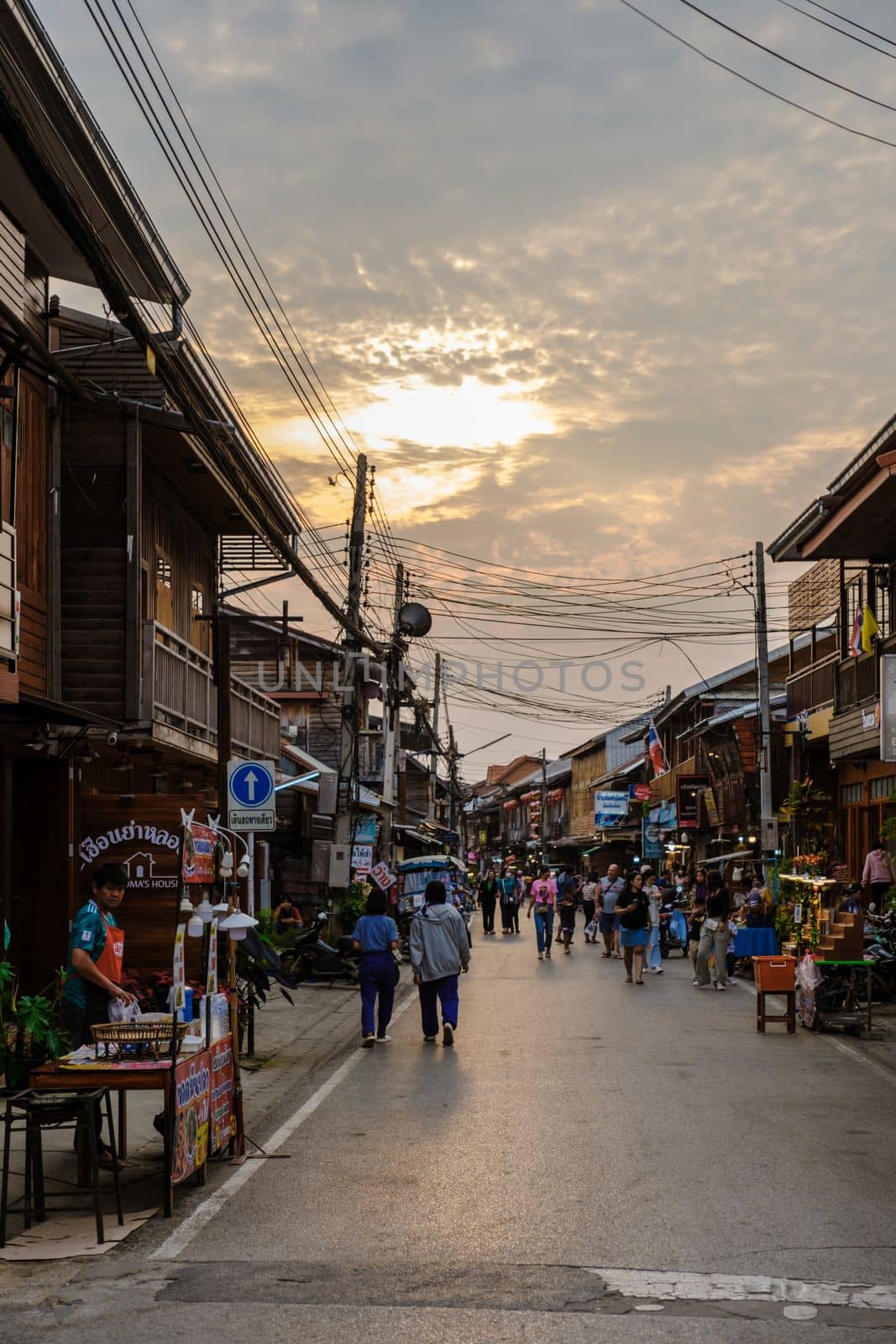 Chiang Khan village North Eastern Thailand February 2023 , A traditional village with wooden house in the evening at the walking street market of Chiang Khan