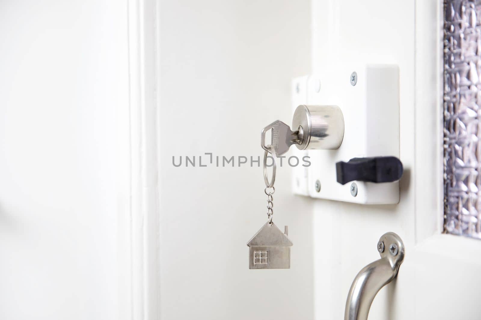 closeup Door lock keys, Real estate concept door handle, Key insert locking and savety with copy space, house,hotel, appartment, new home concept close up